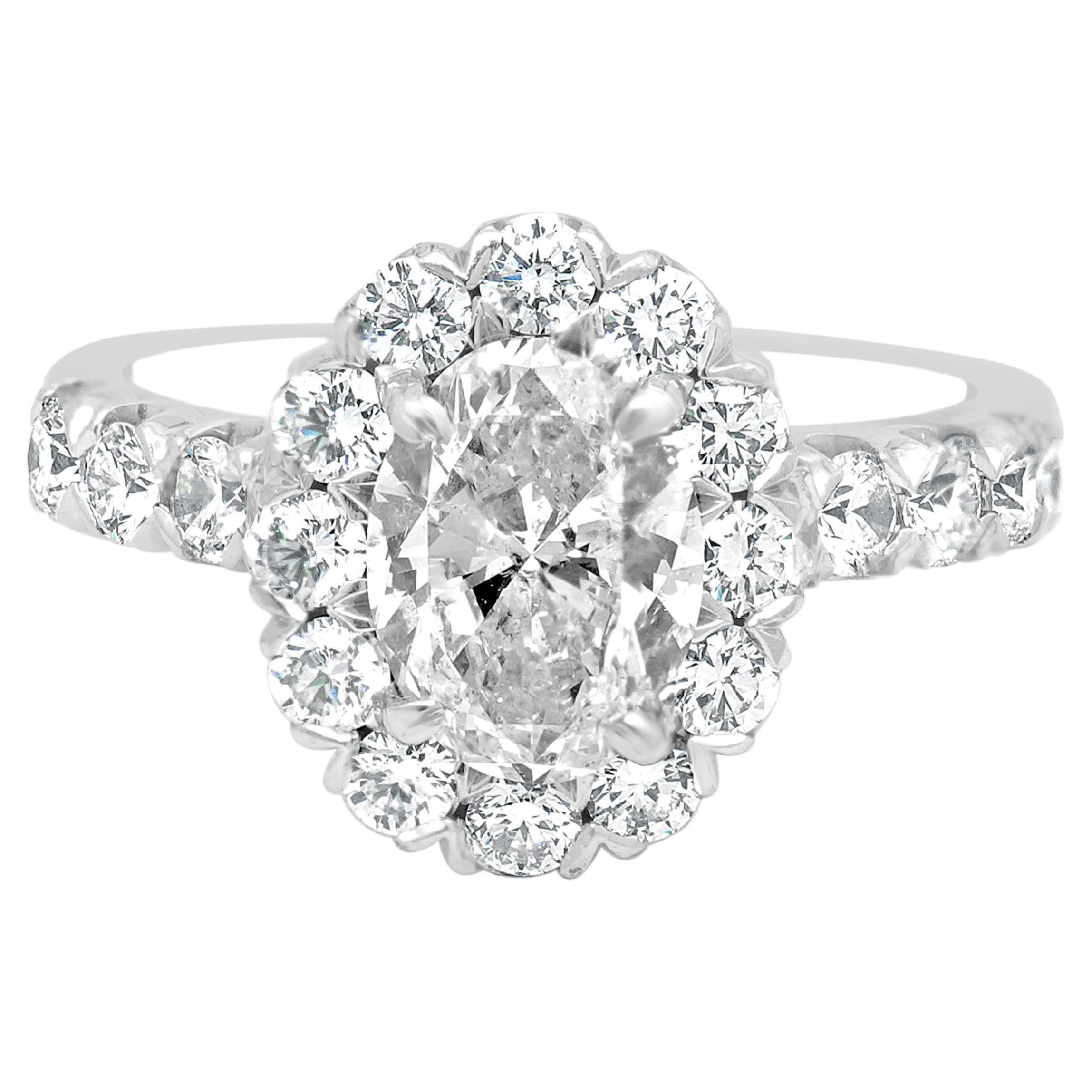 14 Karat White Gold Oval Brilliant and Round Cut Diamond Halo Engagement Ring