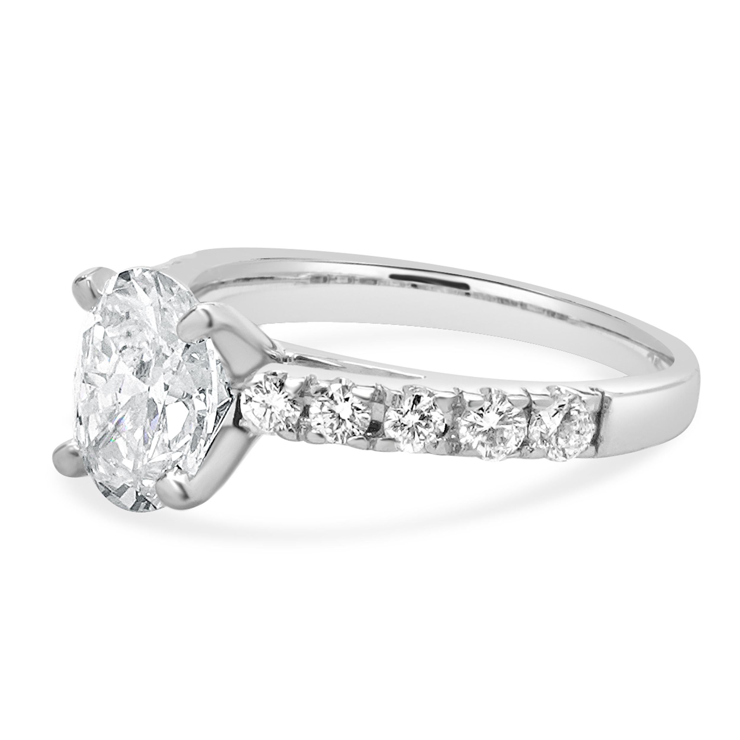 Designer: custom design
Material: 14K white gold
Center Diamond: 1 oval cut = 1.16ct
Color : G
Clarity : VS1
GIA: 6237143611
Diamond: 10 round brilliant cut = 0.40cttw
Color : G
Clarity : SI1
Size: 5.25 complimentary sizing available 
Weight: 2.75