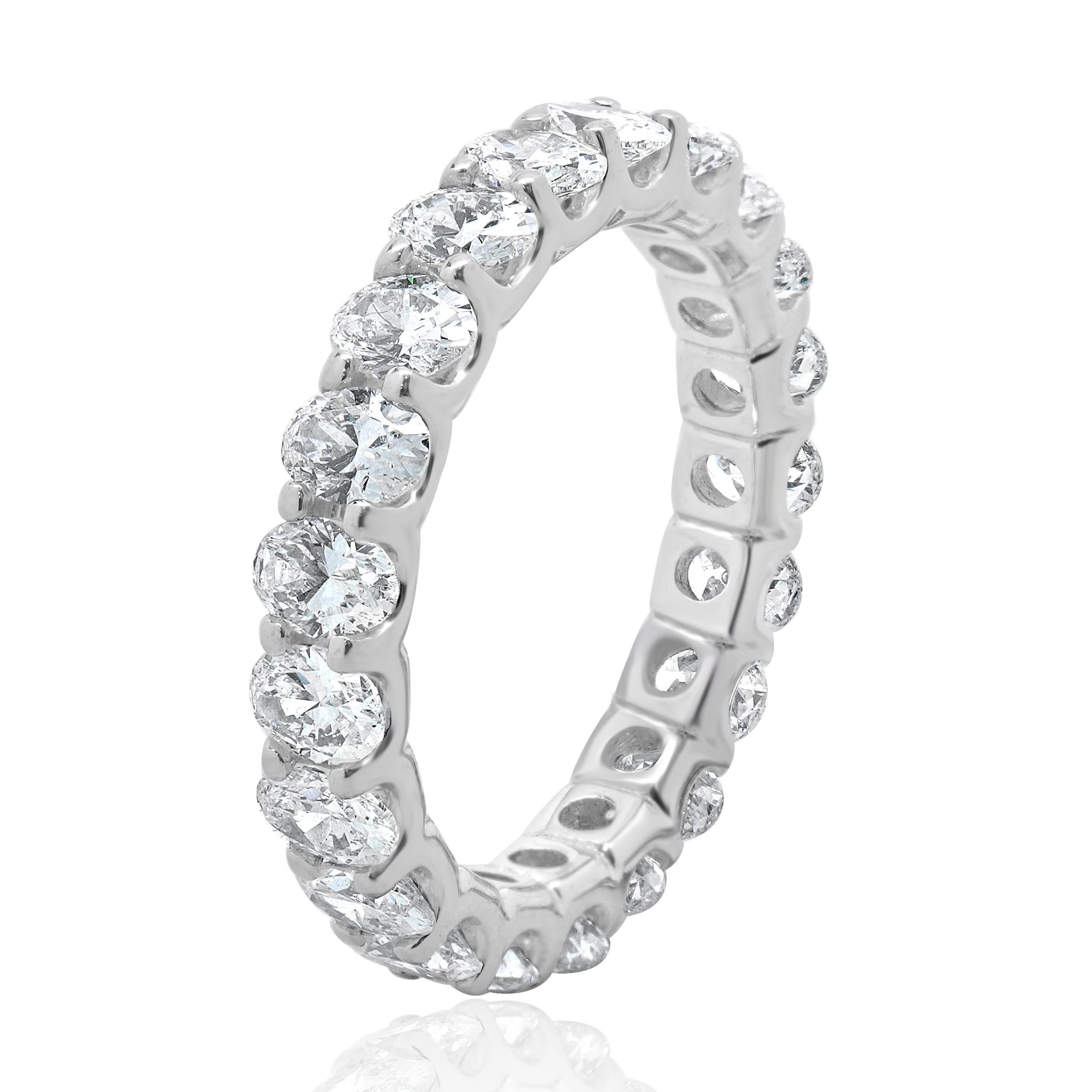 Designer: custom
Material: 14K white gold
Diamond:  21 oval cut = 3.00cttw
Color: G/H
Clarity: VS-SI1
Ring size: 6.5 (please allow two additional shipping days for sizing requests)
Weight: 3.36 grams