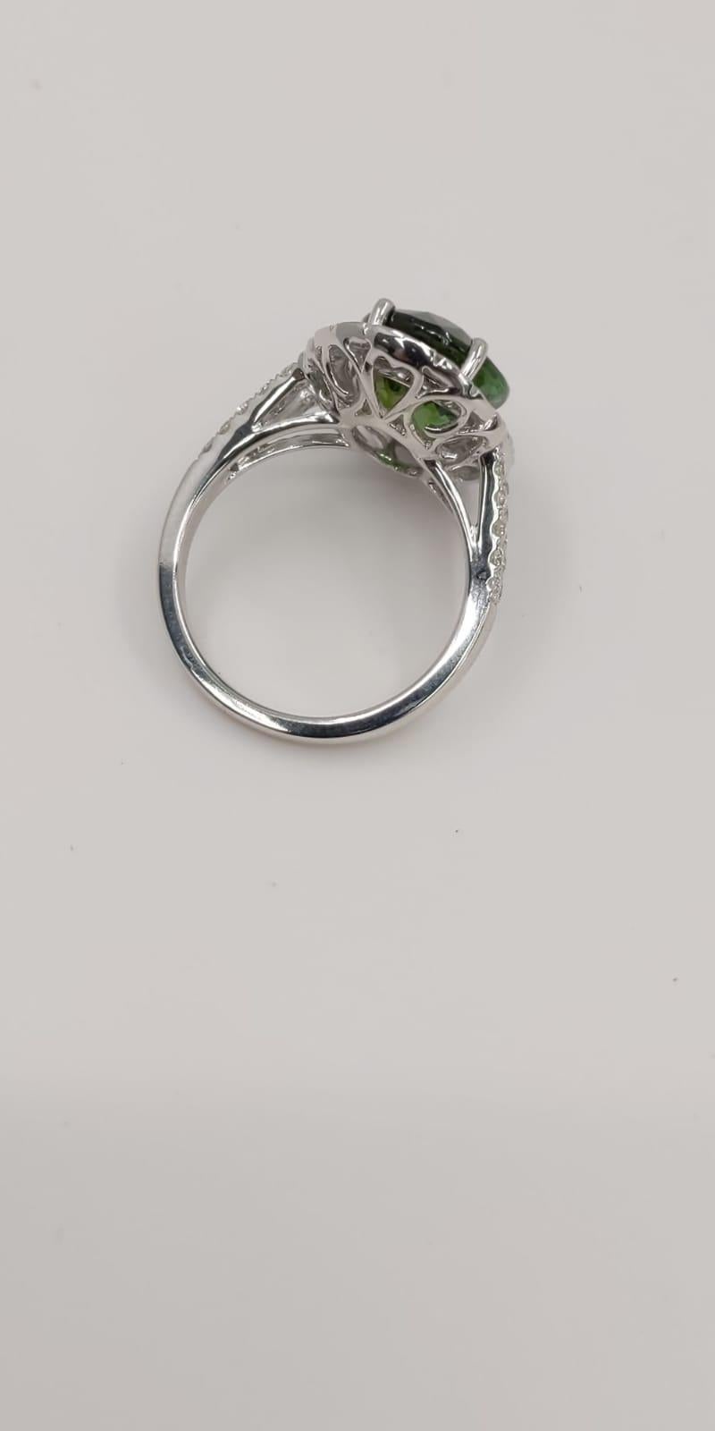 14 Karat White Gold Oval Cut Green Tourmaline and Diamond Ring In New Condition In Great Neck, NY