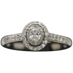 14 Karat White Gold Oval Diamond Halo Ring