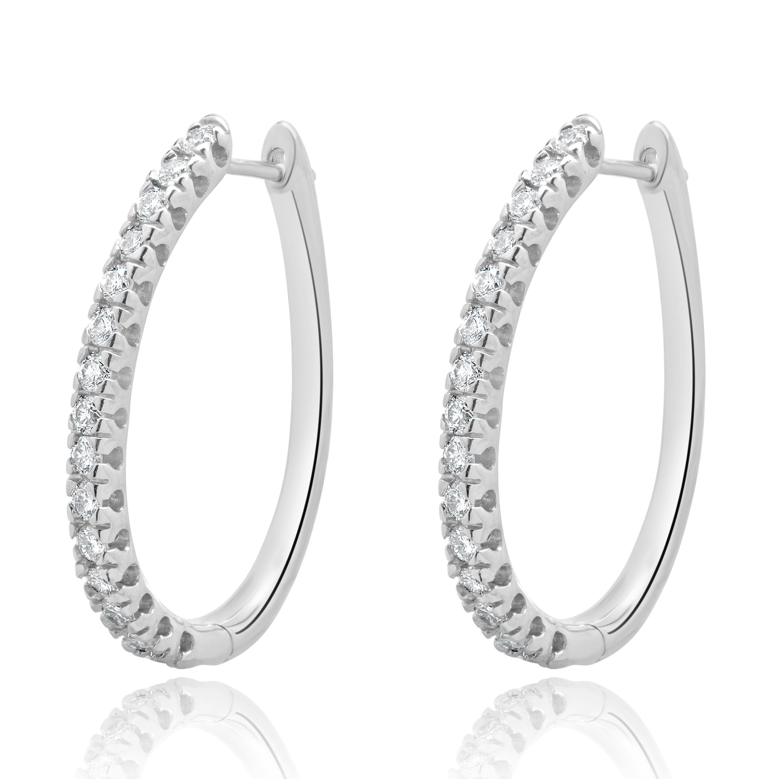 Material: 14K white gold
Diamonds: 30 round brilliant cut =0.90cttw
Color: G / H
Clarity: SI2
Dimensions: earrings measure approximately 28.5mm
Fastenings: snap backs
Weight: 7.56 grams
