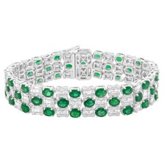 14 Karat White Gold Oval Emerald
Diamond Bracelet 14 Karat White Gold Oval Emerald
Diamond Bracelet