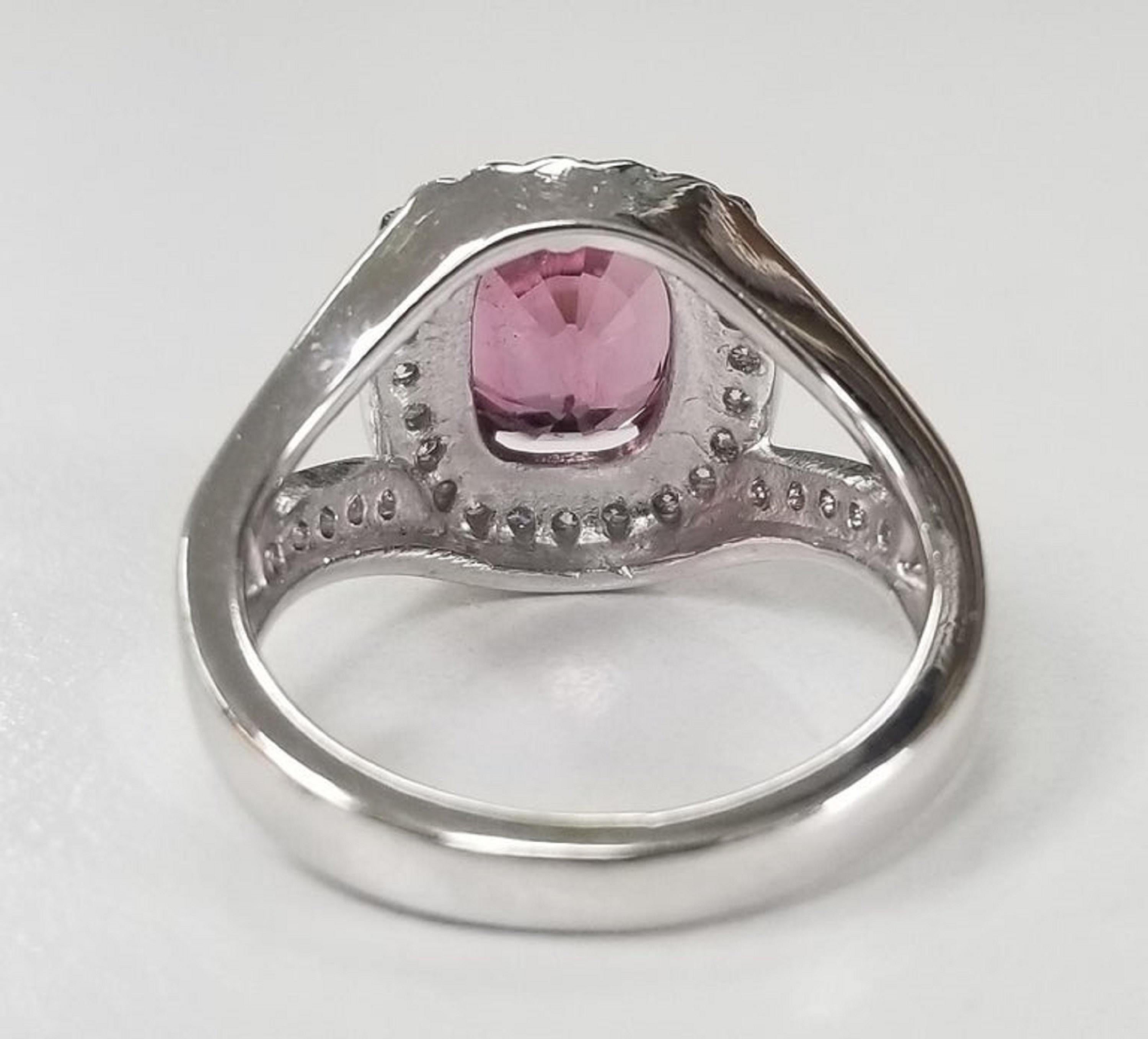 Women's or Men's 14 Karat White Gold Oval Pink Tourmaline Diamond Halo Ring For Sale