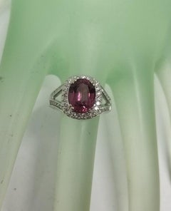14 Karat White Gold Oval Pink Tourmaline Diamond Halo Ring