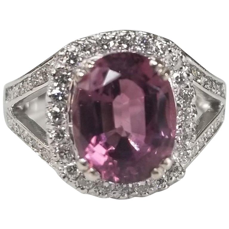 14 Karat White Gold Oval Pink Tourmaline Diamond Halo Ring For Sale