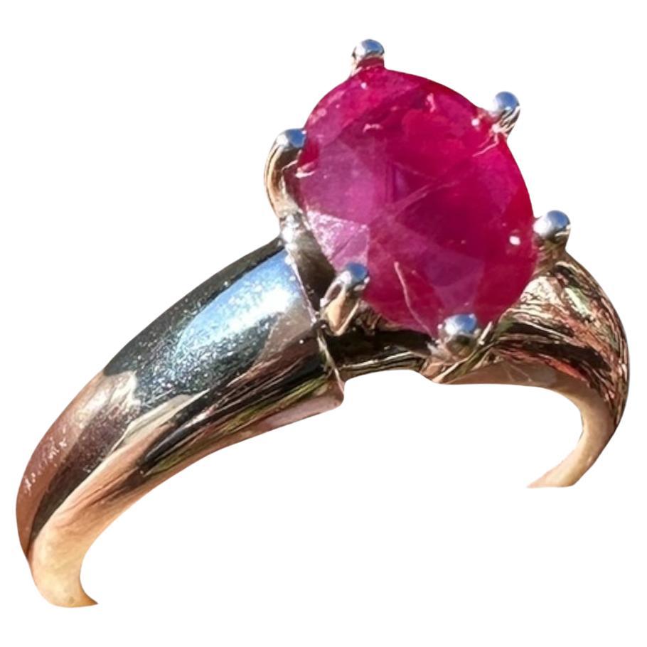 Anillo solitario natural de oro blanco de 14 quilates con rubí rojo ovalado de 1,25 quilates en venta