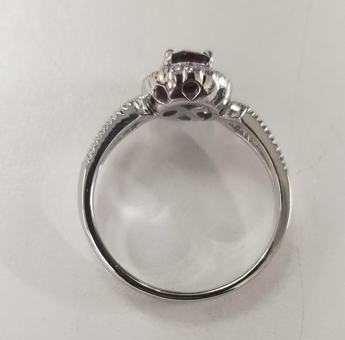14 Karat White Gold Oval Ruby and Diamond Halo Ring In New Condition For Sale In Los Angeles, CA