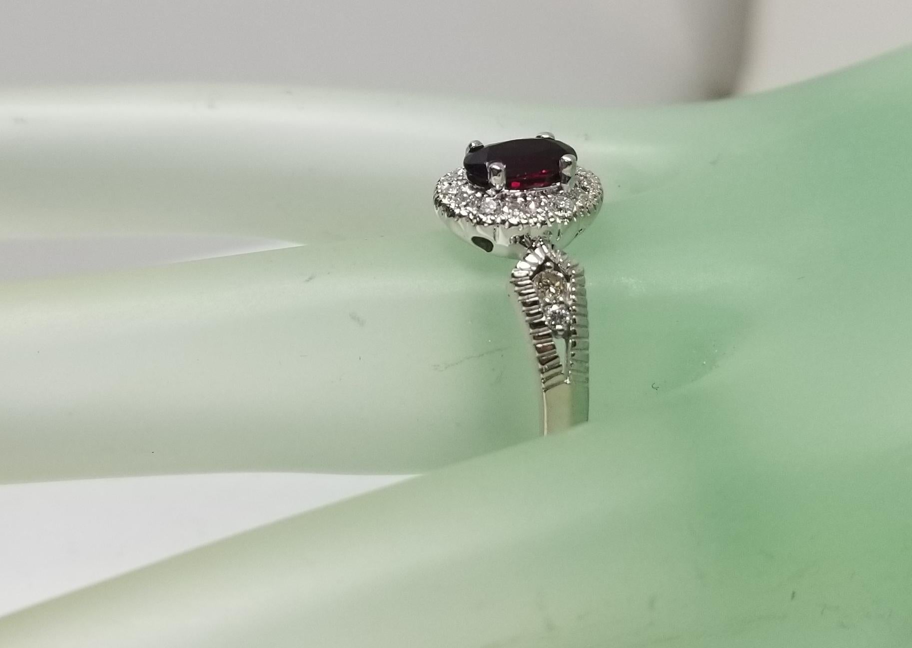 14 Karat White Gold Oval Ruby and Diamond Halo Ring For Sale 2