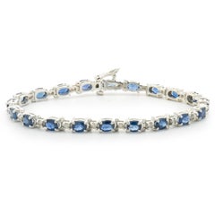 14 Karat White Gold Oval Sapphire and Diamond Inline Bracelet