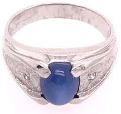 14 Karat White Gold Oval Sapphire Cabochon Ring with Diamond Accents