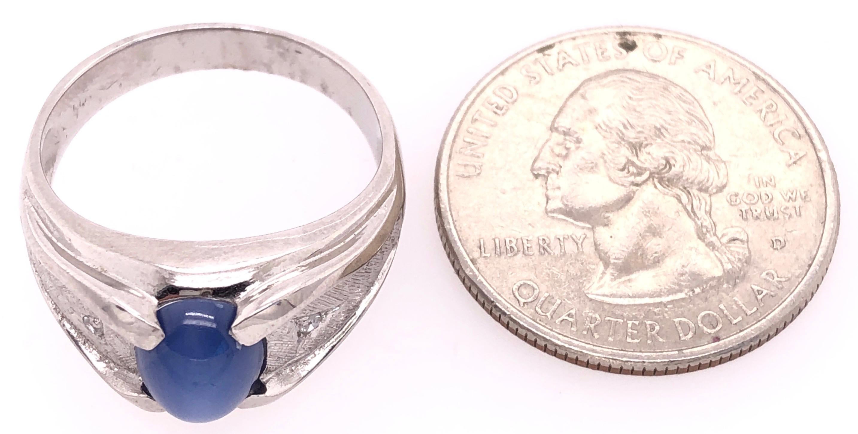 14 Karat White Gold Oval Sapphire Cabochon Ring with Diamond Accents For Sale 1
