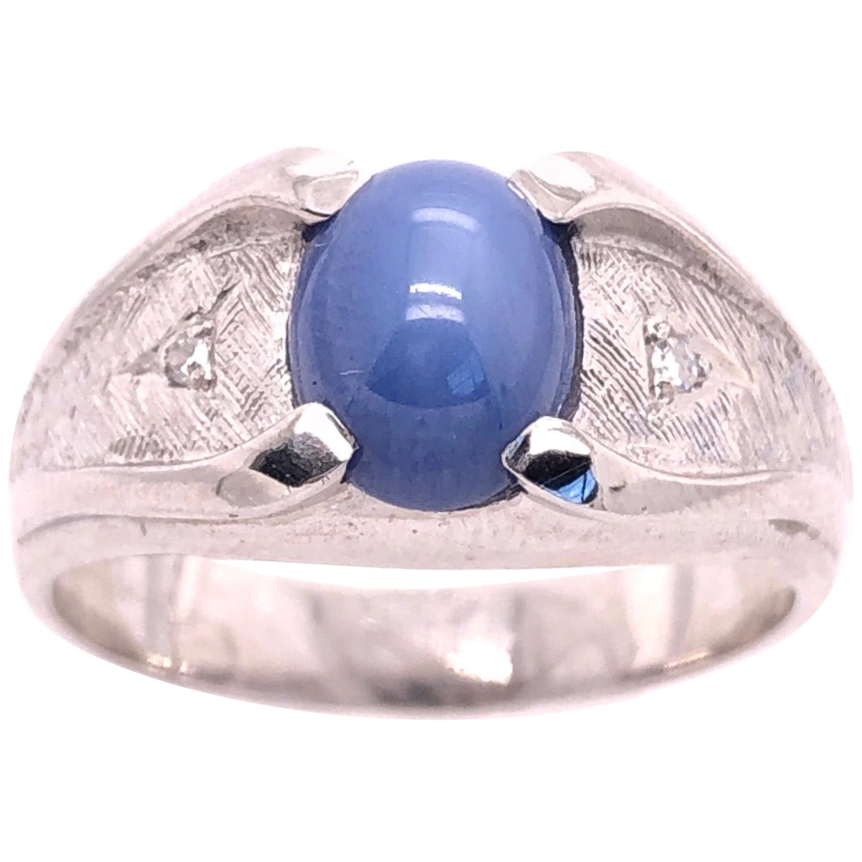 14 Karat White Gold Oval Sapphire Cabochon Ring with Diamond Accents