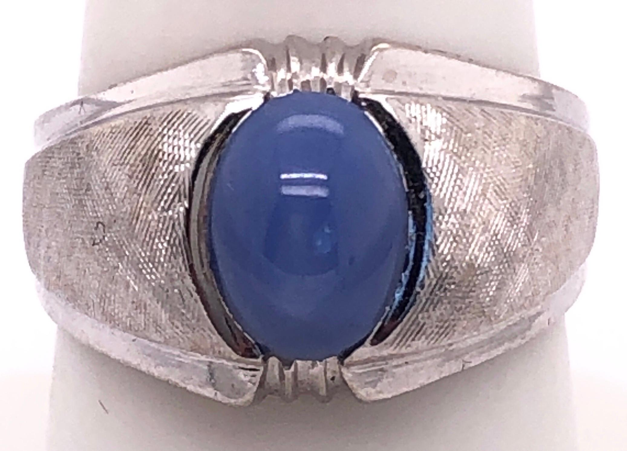 Contemporary 14 Karat White Gold Oval Sapphire Cabochon Solitaire Ring For Sale