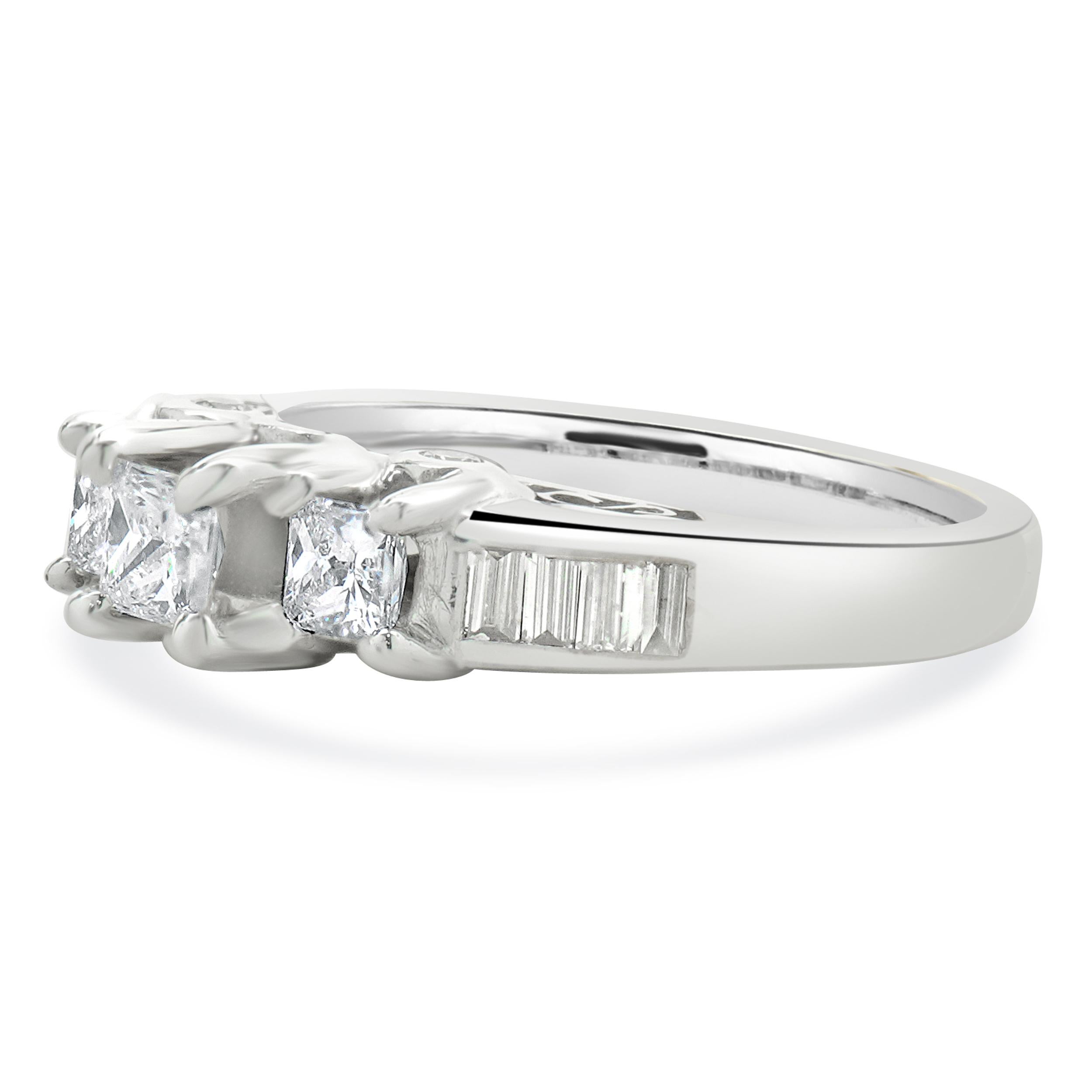 Material: 14K white gold
Diamond: 17 princess, round, and baguette cut = 1.00cttw
Color: G/H
Clarity: SI2
Ring Size: 6.5 (please allow up to 2 additional business days for sizing requests)
Dimensions: ring top measures 5.8 mm wide
Weight: 6.05 grams
