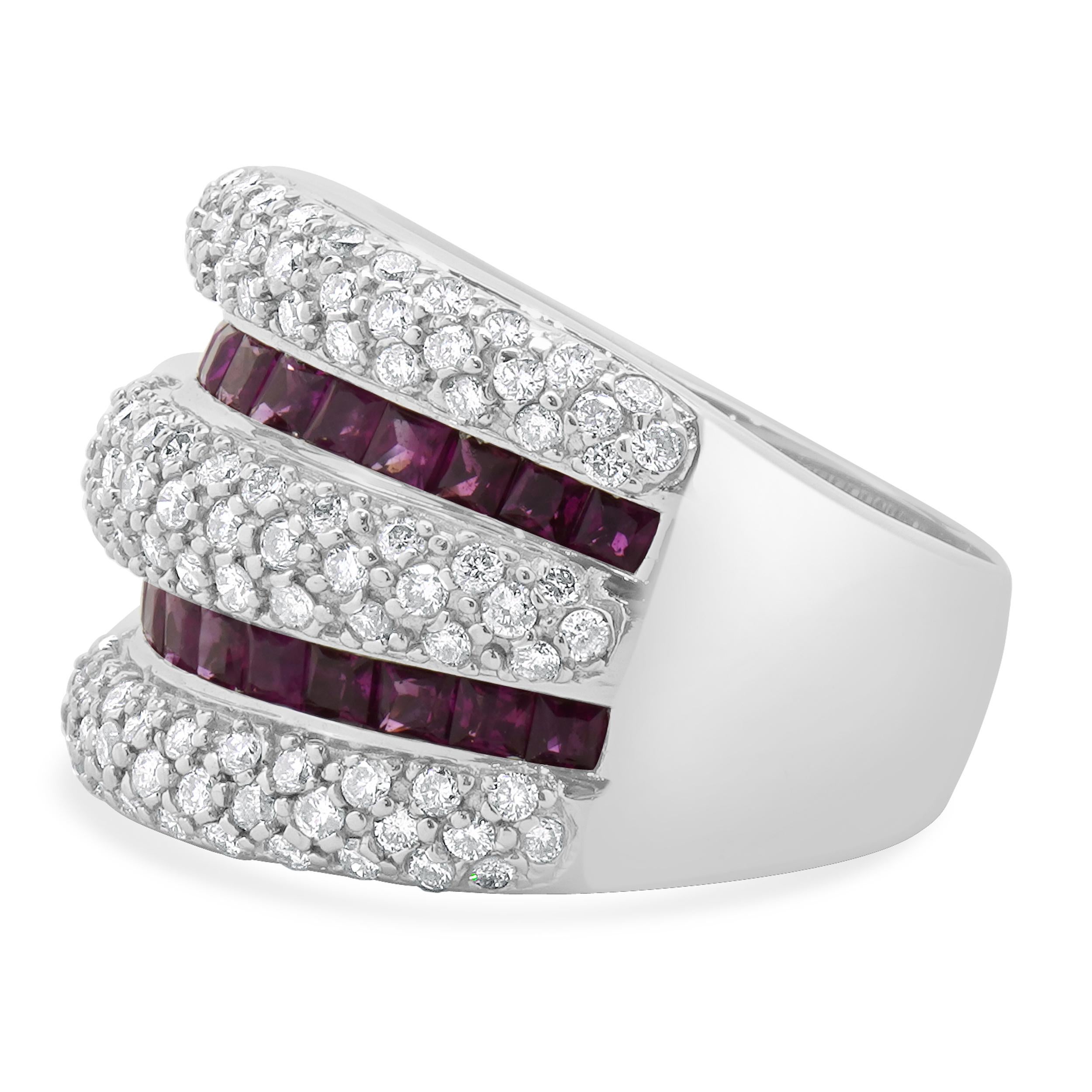 Designer: custom
Material: 14K white gold
Diamonds: 50 round brilliant cut = 0.50cttw
Color: I
Clarity: I1
Ruby: 28 princess cut = 1.50cttw
Dimensions: ring top measures 16.6mm wide
Ring Size: 6.75 (complimentary sizing available)
Weight: 13.24