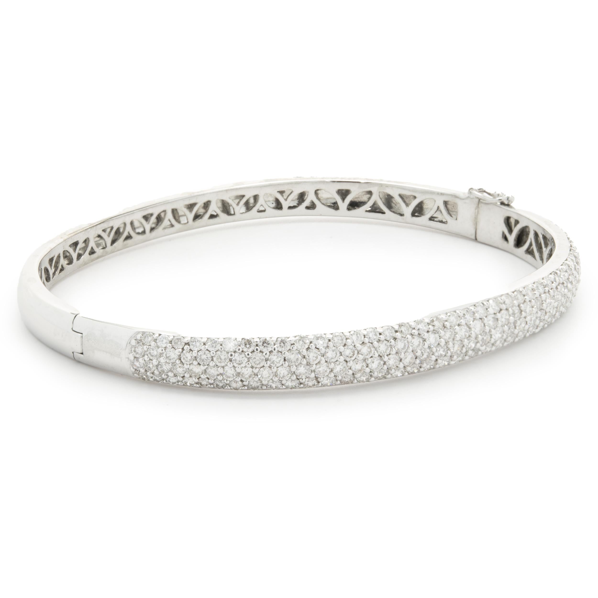 Designer: custom design
Material: 14K white gold
Diamonds: 172 round brilliant cut = 2.50cttw
Color: G
Clarity: SI2
Dimensions: bracelet will fit up to a 6.5-inch wrist
Weight: 17.45 grams