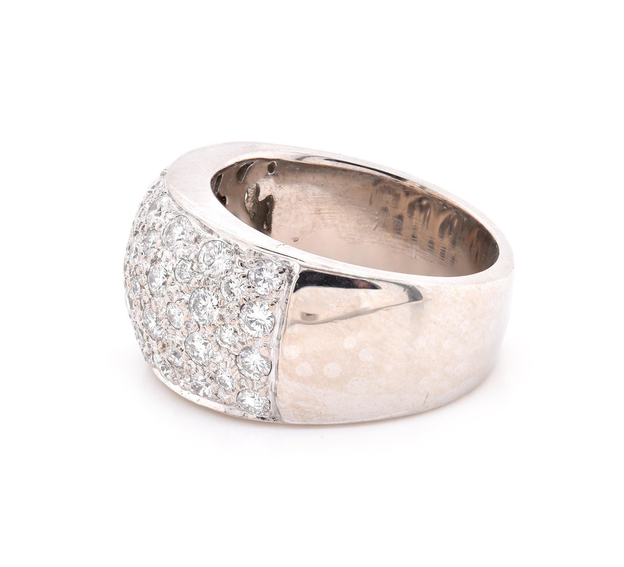 Designer: custom
Material: 18K white gold
Diamond: 53 round brilliant cut = 1.30cttw
Color: G
Clarity: SI1
Ring size: 4 (please allow two additional shipping days for sizing requests)
Weight:  7.5 grams
