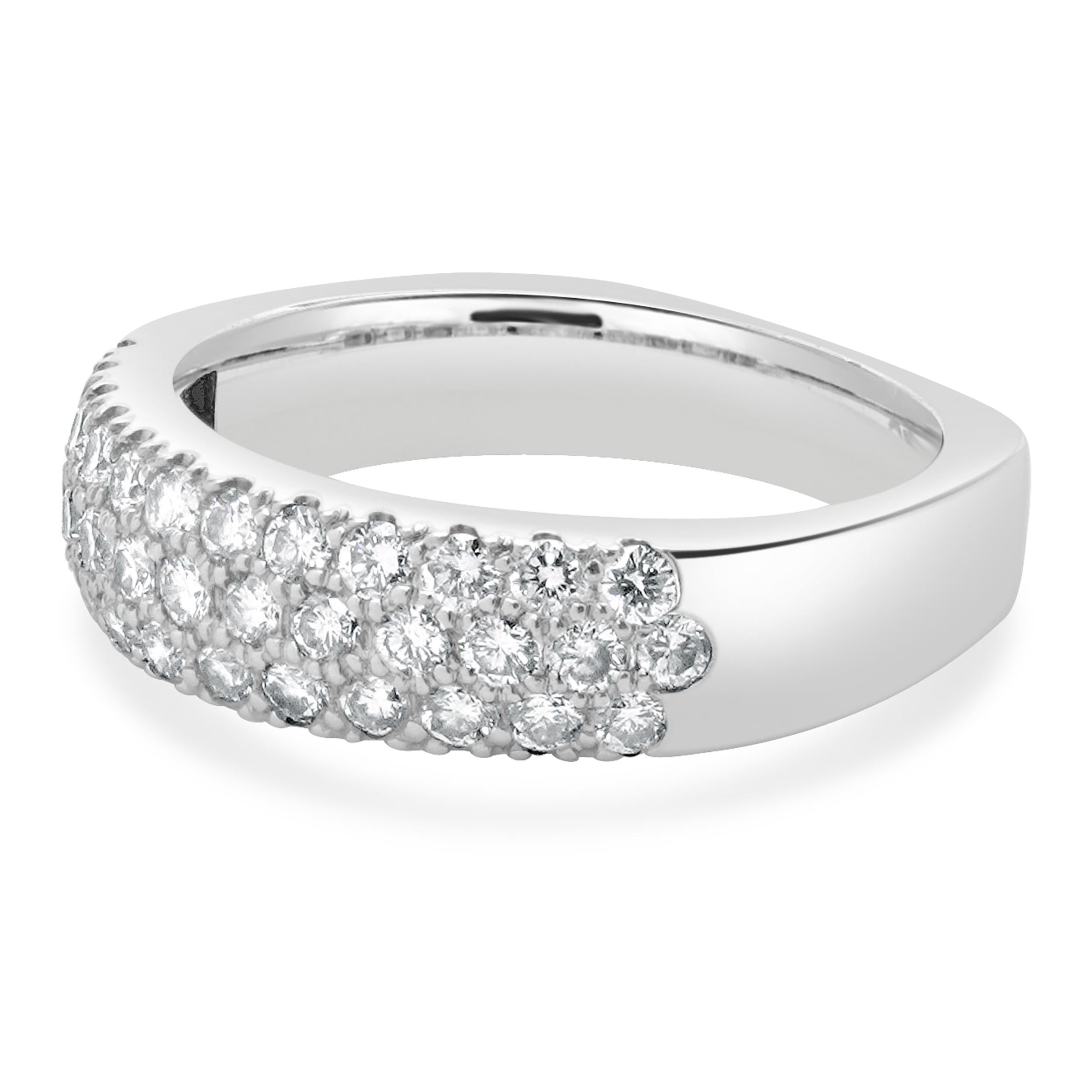 Material: 14K white gold
Diamond: 35 round cut = 0.52cttw
Color: I
Clarity: SI1
Ring Size: 8 (please allow up to 2 additional business days for sizing requests)
Dimensions: ring top measures 5.6mm wide
Weight: 5.88 grams

