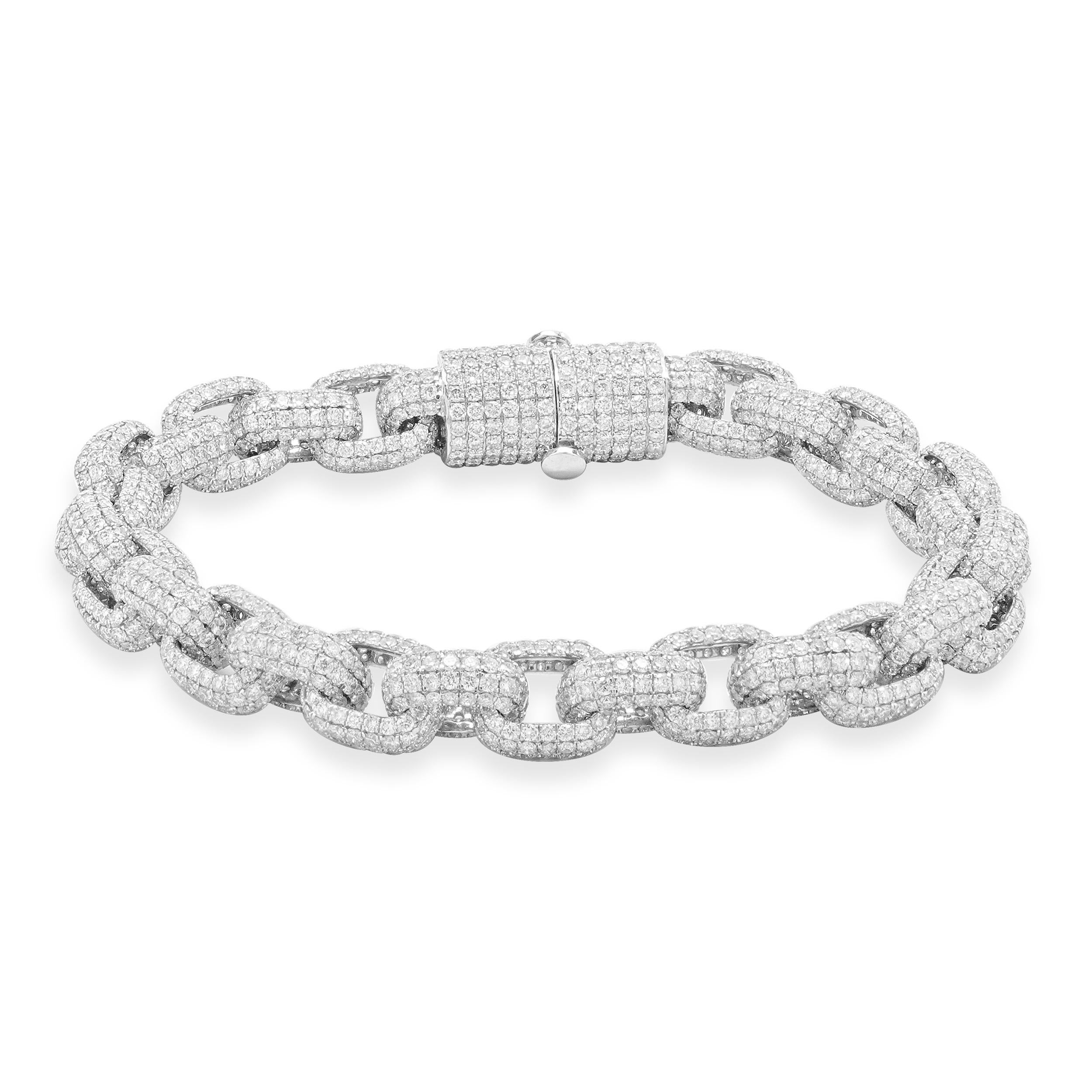 Designer: custom design
Material: 14K white gold
Diamond: round brilliant cut = 25.30cttw
Color: G
Clarity: VS-SI1
Dimensions: bracelet will fit up to a 7-inch wrist
Weight: 32.33 grams
