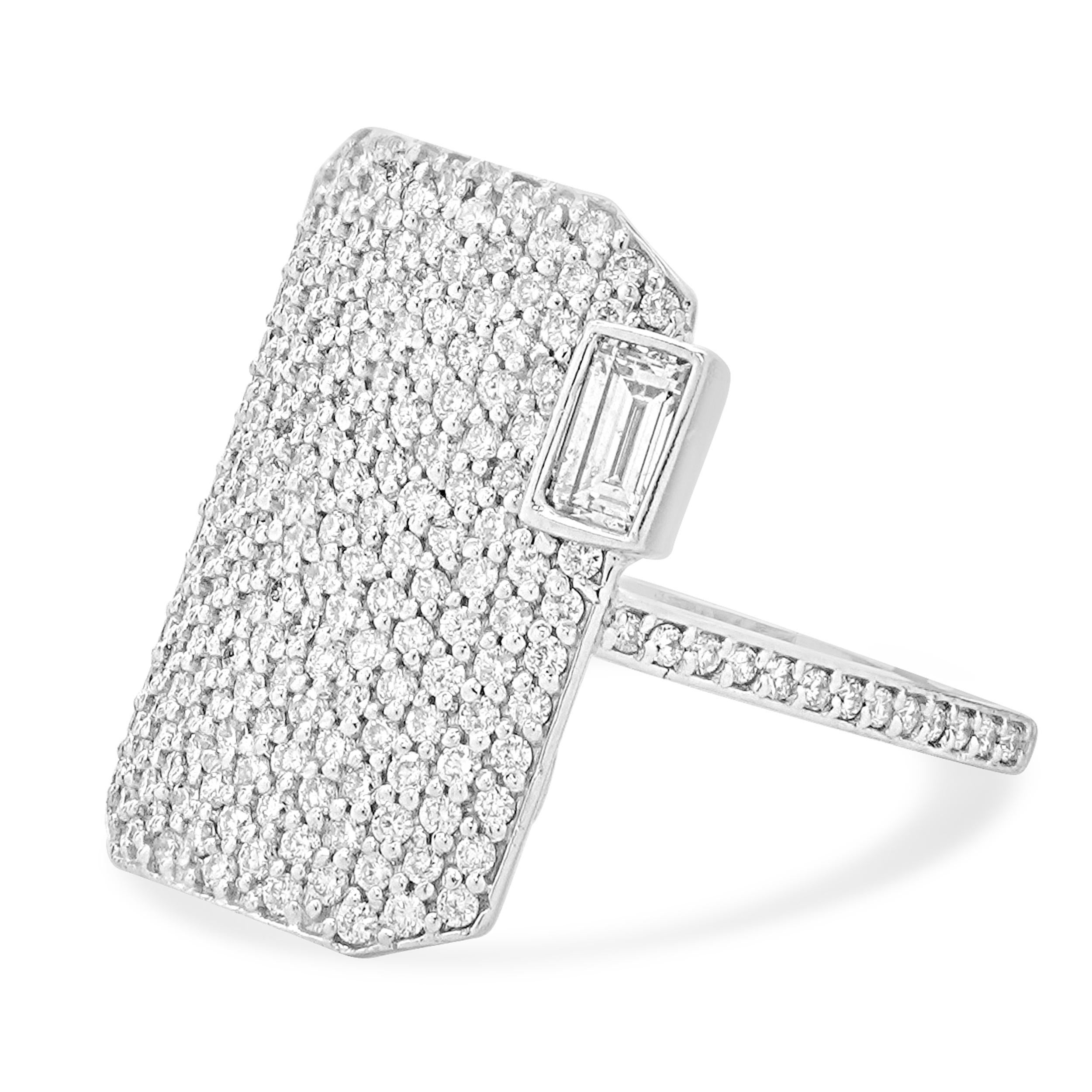 Material: 14k white gold
Diamond: round and emerald cut = 2.00cttw
Color: G
Clarity: SI1-2
Size: 7.25
Weight: 8.94 grams
