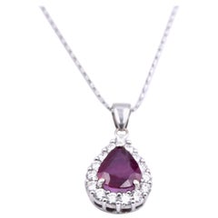 14 Karat White Gold Pear Cut Ruby and Diamond Halo Pendant