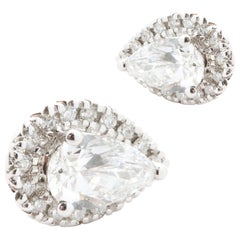 14 Karat White Gold Pear Diamond Stud Earrings with Diamond Halo