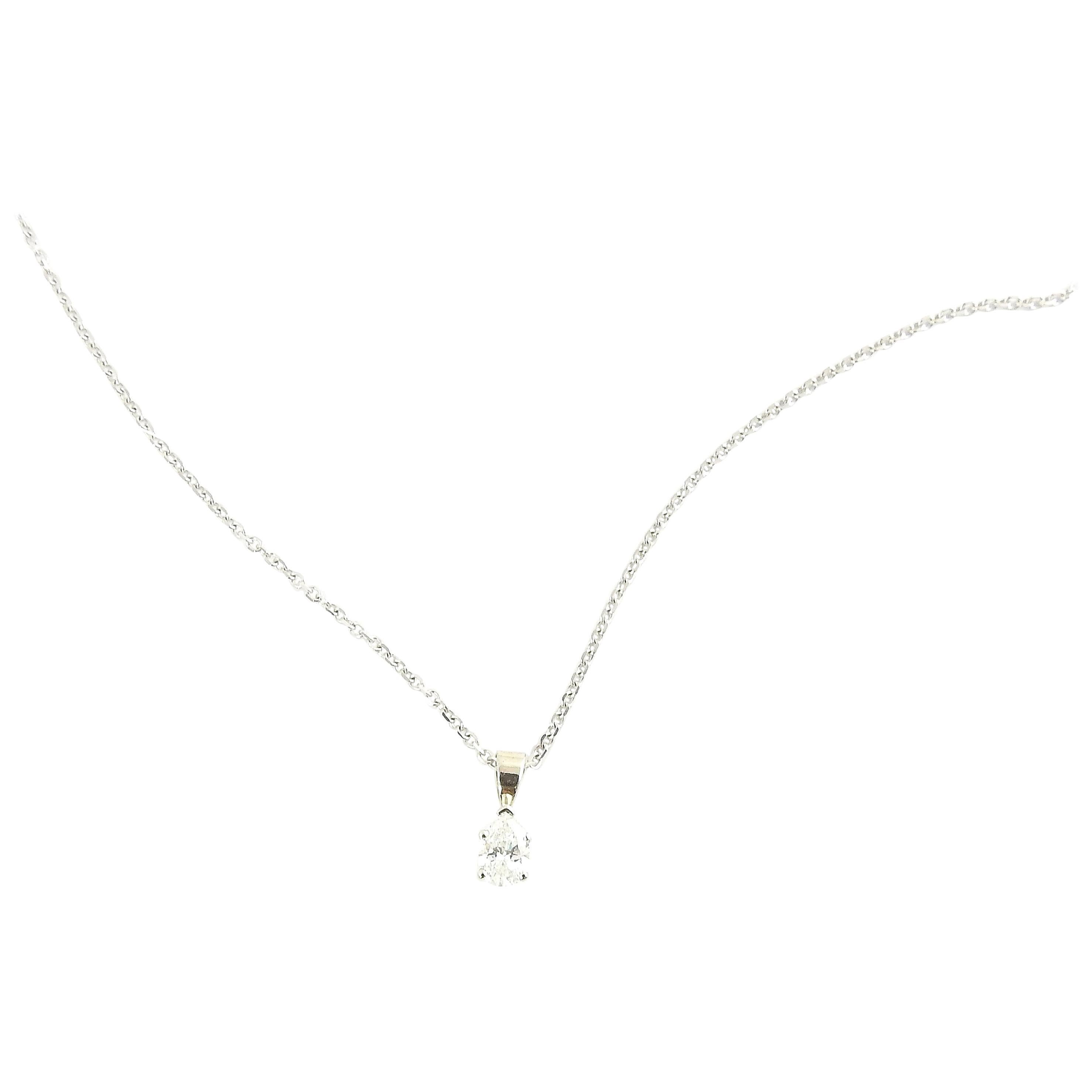 Vintage 14 Karat White Gold Diamond Pendant Necklace-

This sparkling pendant features one pear-shaped diamond suspended from a classic 14K white gold necklace.

Total diamond weight:  .71 ct. ( weighed on diamond scale)

Diamond clarity: 