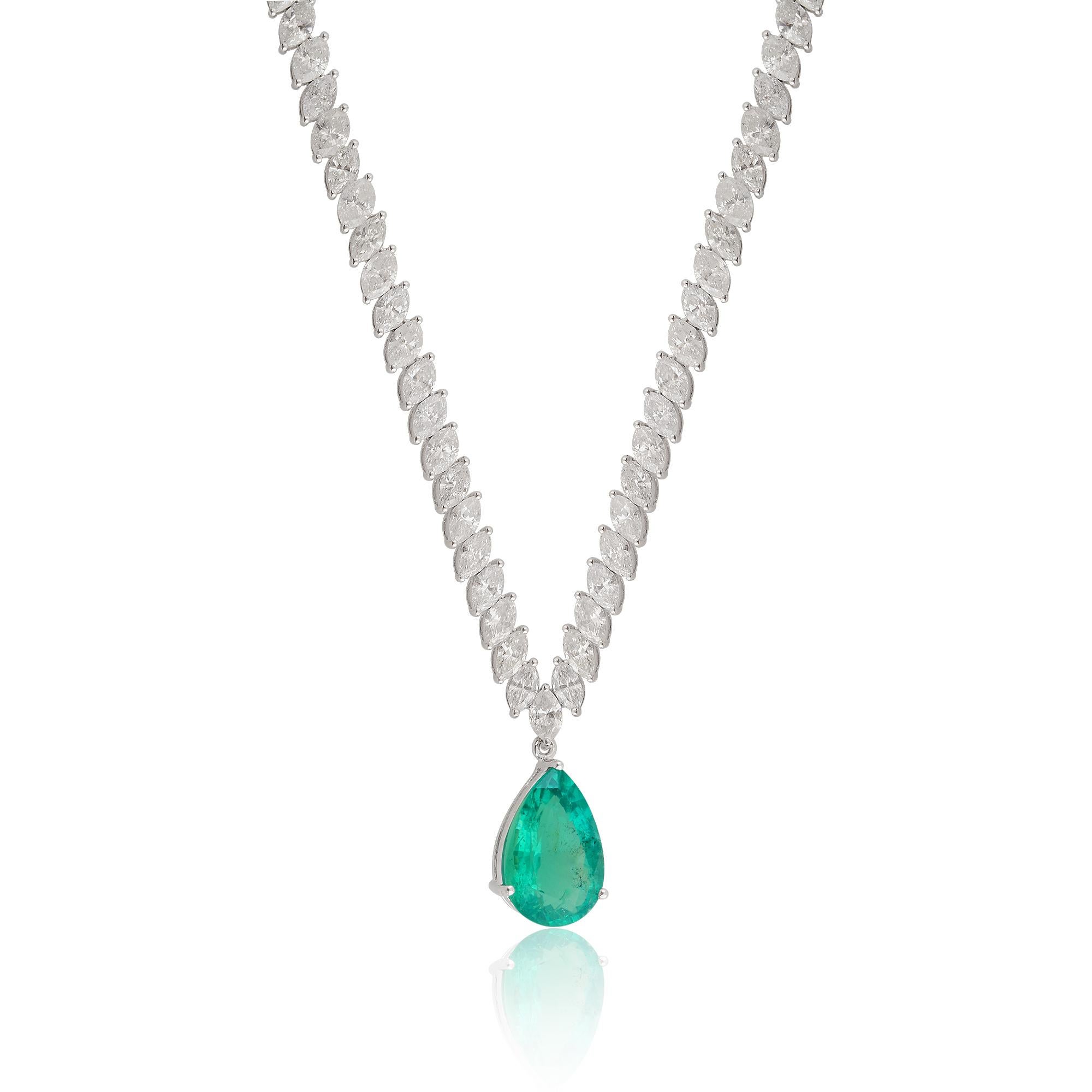 A charm necklace featuring a pear-shaped Zambian emerald gemstone and diamonds in 14 karat white gold is a stunning and elegant piece of jewelry. The necklace typically features a single pear-shaped Zambian emerald as the centerpiece, surrounded by