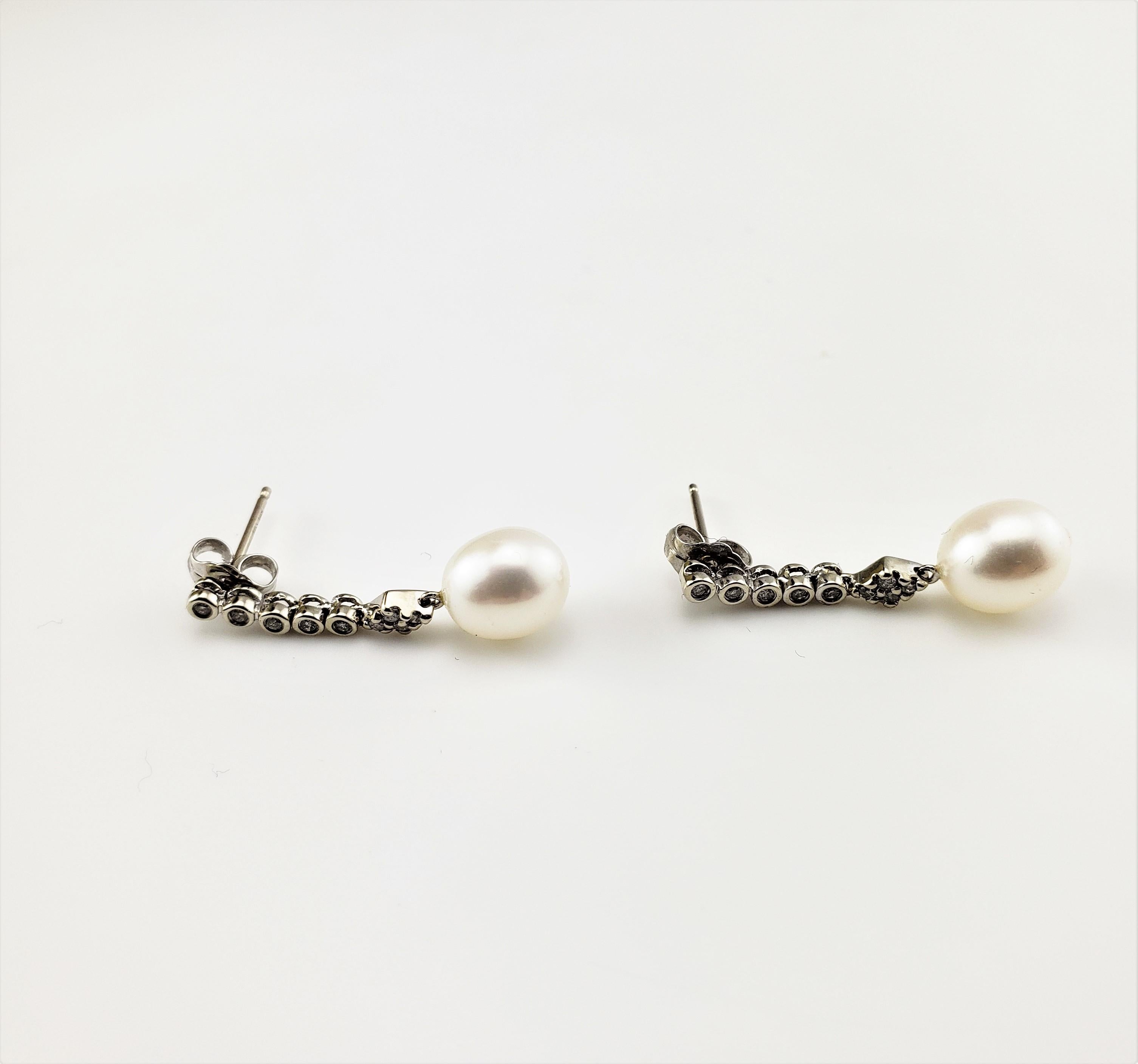 Women's 14 Karat White Gold Pearl and Diamond Dangle Earrings For Sale