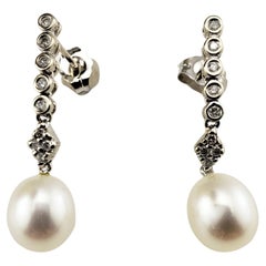 Vintage 14 Karat White Gold Pearl and Diamond Dangle Earrings