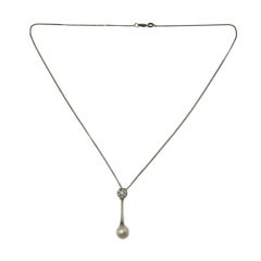 Collana con ciondolo di perle e diamanti in oro bianco 14 carati