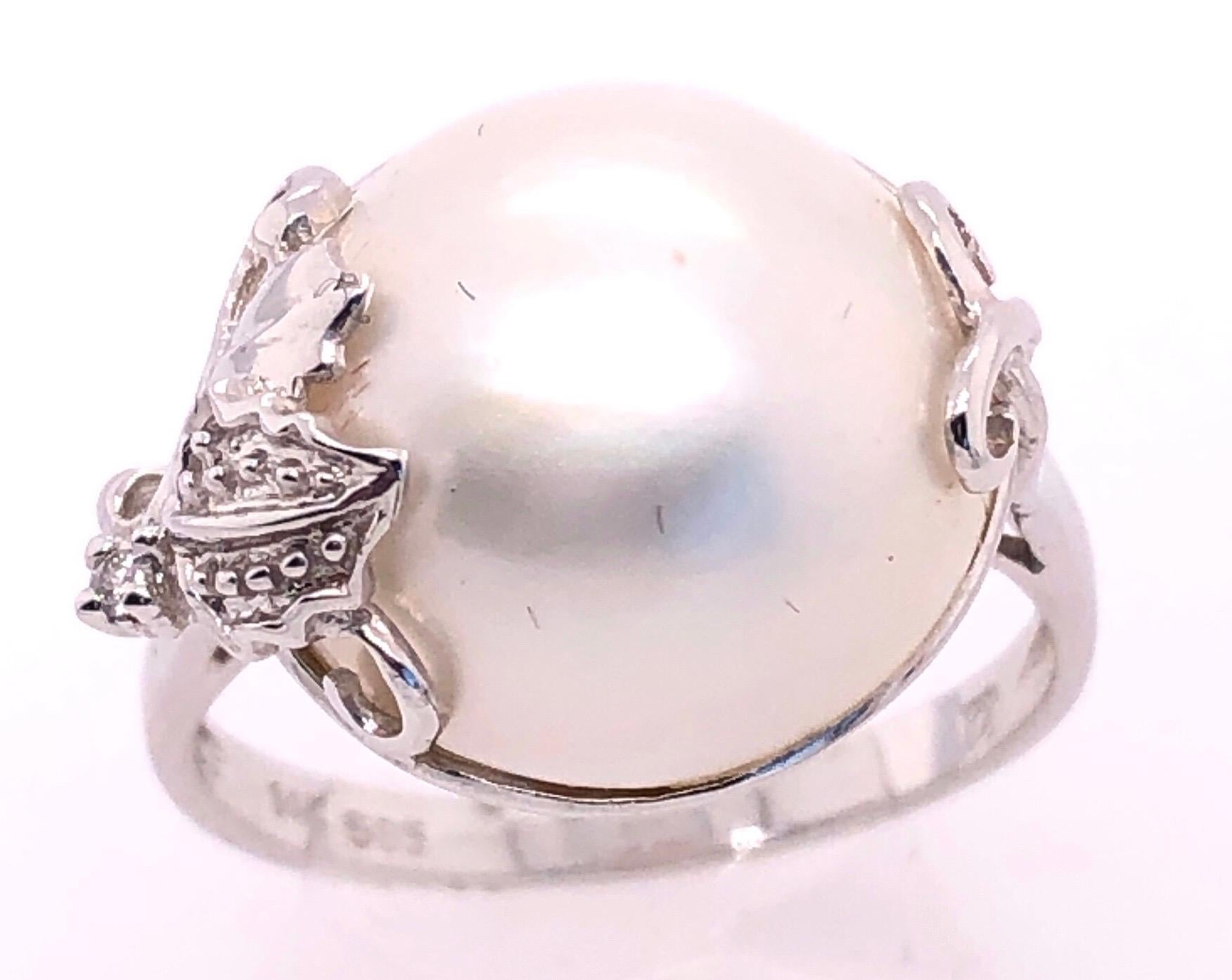 pearl ring with diamond accents