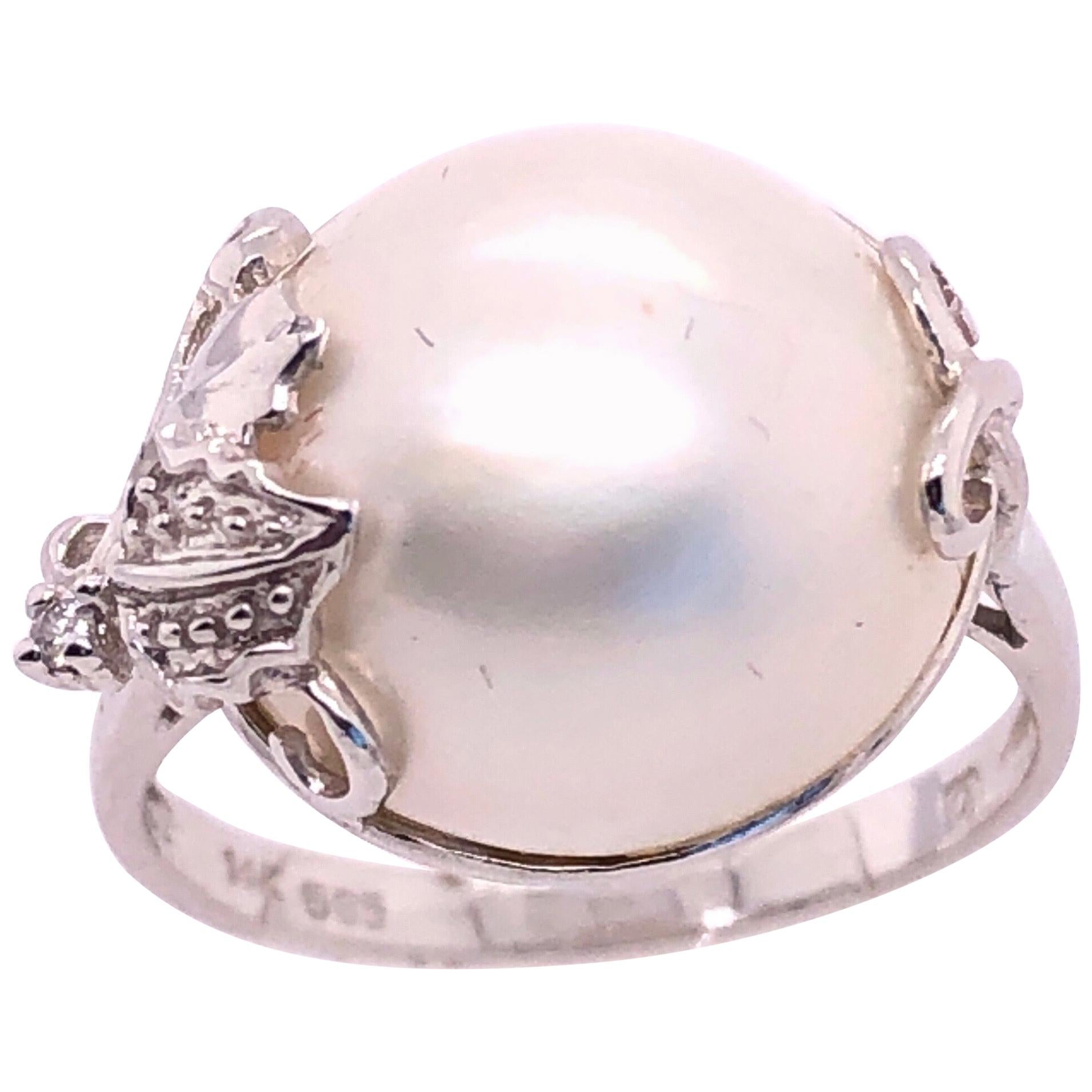 14 Karat White Gold Pearl Solitaire with Diamond Accent Ring For Sale