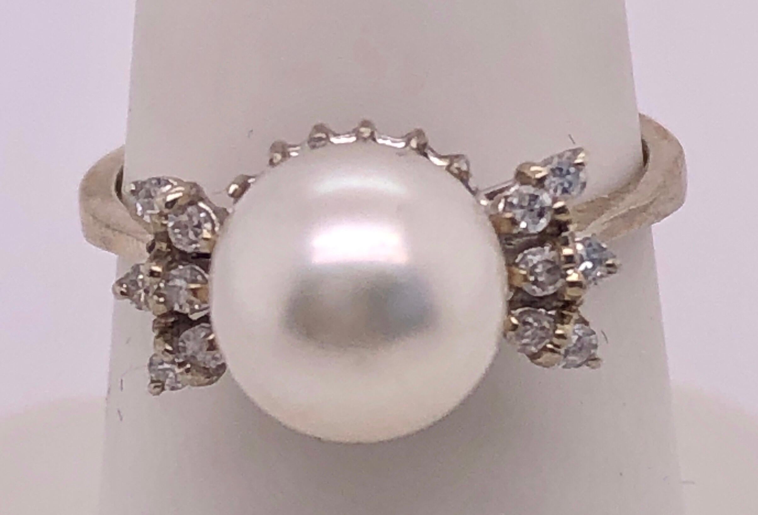 Modern 14 Karat White Gold Pearl Solitaire with Diamond Accents Ring For Sale