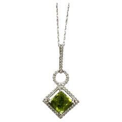 14 Karat White Gold Peridot Halo Diamond 1.00 Carat Pendant