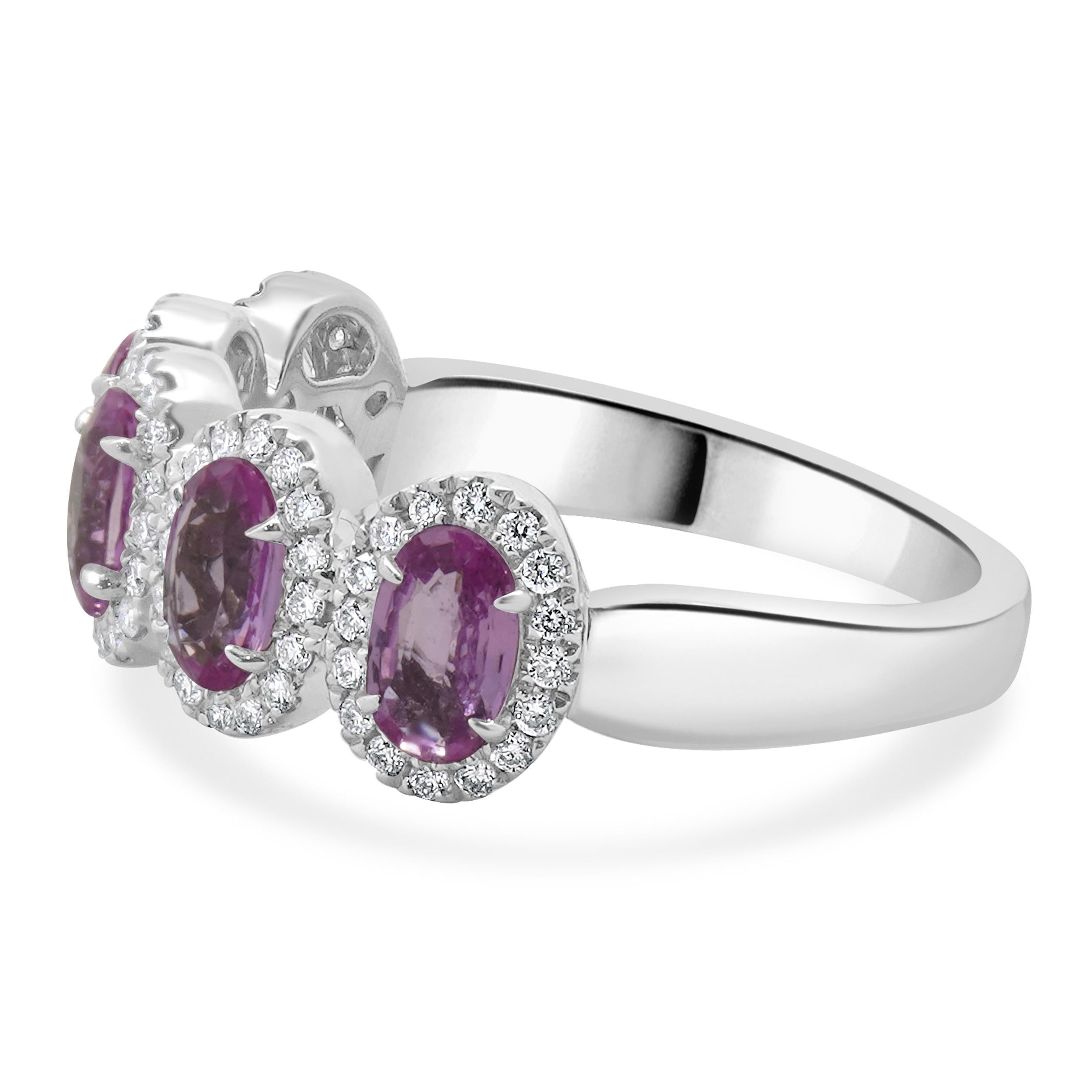 Designer: custom
Material: 14K white gold
Diamond: 80 round brilliant cut = 0.27cttw
Color: G
Clarity: VS-SI1
Pink Sapphire: 5 oval= 1.34cttw
Ring size: 6.5 (please allow two additional shipping days for sizing requests)
Weight: 3.45 grams
