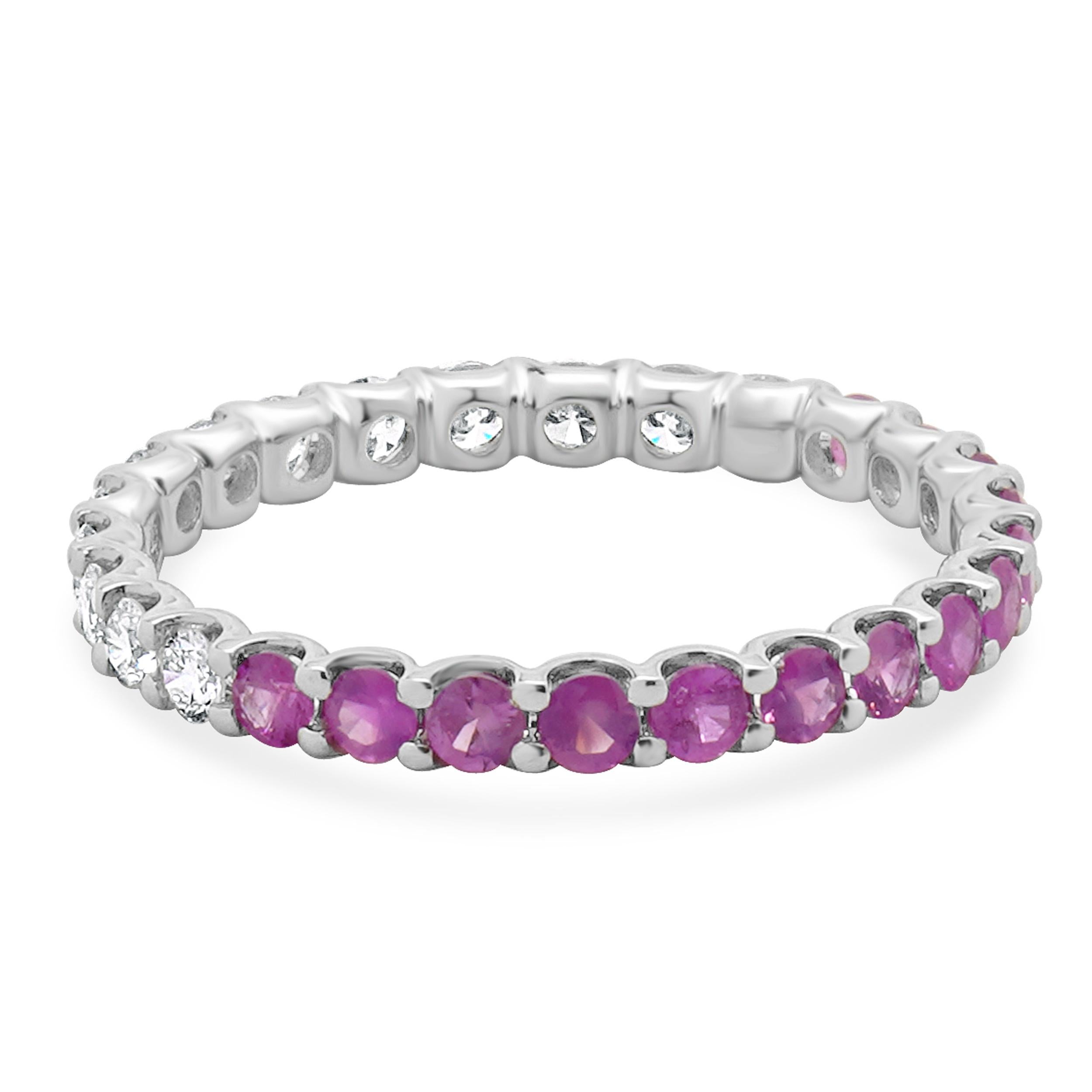Designer: custom
Material: 14K white gold
Diamond: 13 round brilliant cut = 0.56cttw
Color: G
Clarity: SI1
Pink Sapphires: 14 round cut= 0.56cttw
Ring Size: 6 (please allow two extra shipping days for sizing requests) 
Weight: 1.15 grams