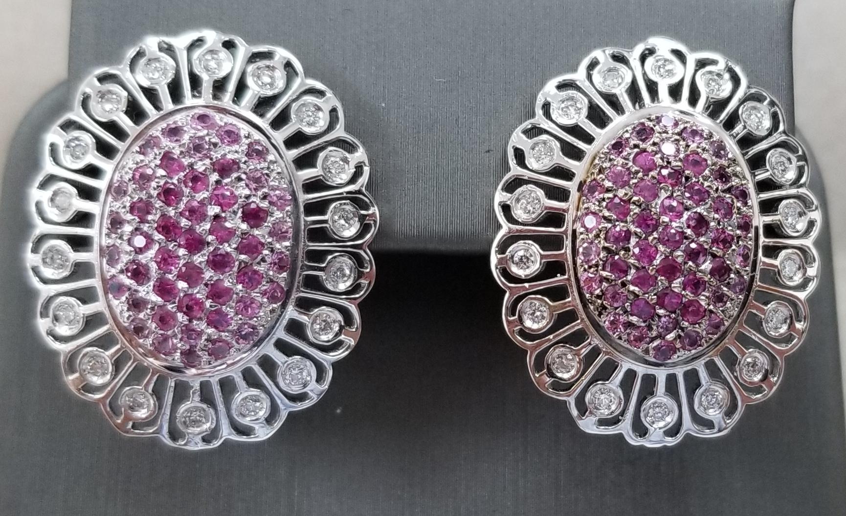 14k white gold multi shade of pink sapphires weighing 2.35cts. paved and then 38 round full cut diamonds of fine quality weighing .50pts. in a lace setting.  French backs for comfort.