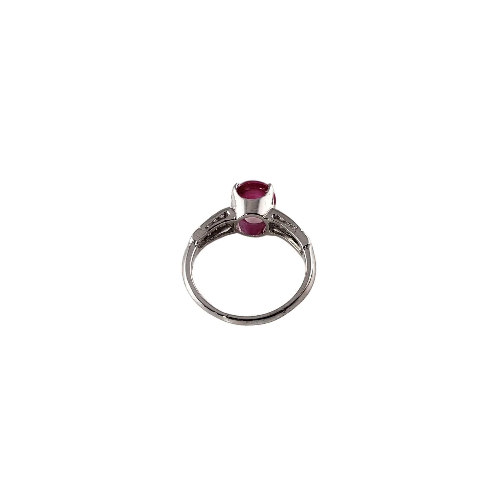 Vintage 14 Karat White Gold Pink Sapphire and Diamond Ring Size 6 JAGi Certified-

This lovely ring features one oval cabochon pink sapphire (7.5 mm x 6.9 mm) and 12 round single cut diamonds set in classic 14K white gold. Shank: 1.5 mm.

Sapphire