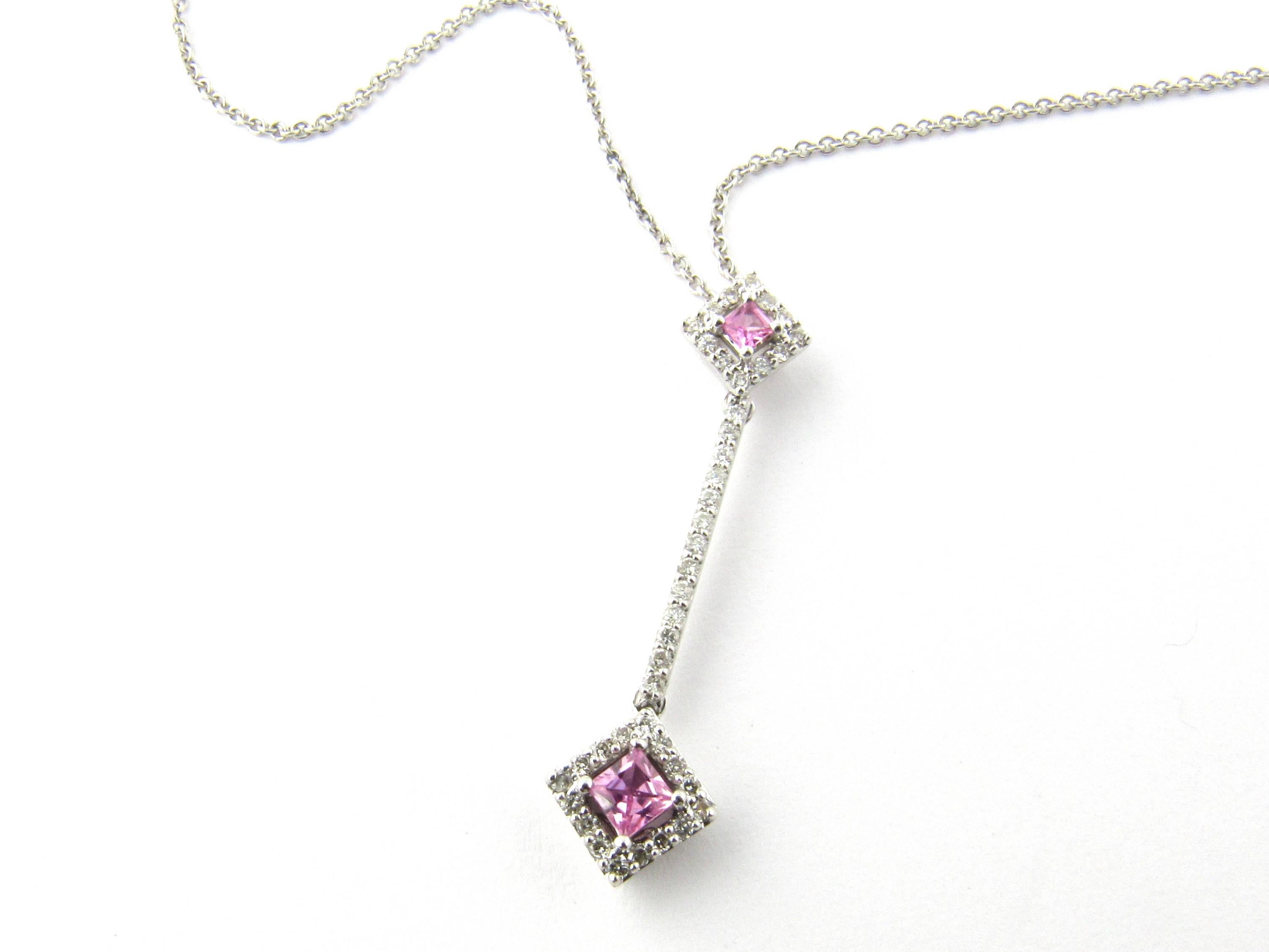 Vintage 14 Karat White Gold Pink Topaz and Diamond Pendant Necklace- 
This sparkling pendant features two genuine square pink topaz stones (3 mm and 4 mm) and 41 round brilliant cut diamonds set in a stunning drop design. Hangs from 17 inch white