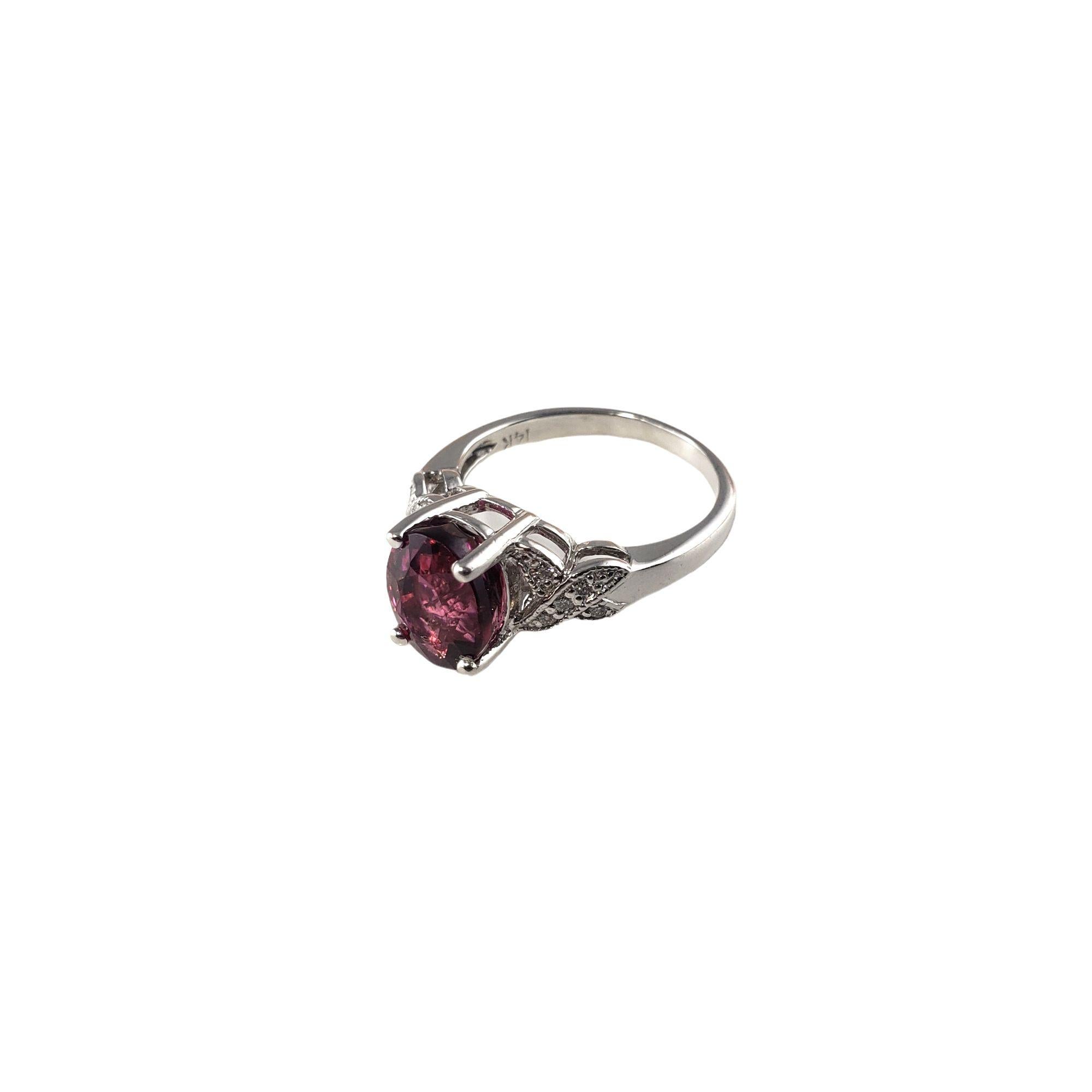 Oval Cut 14 Karat White Gold Pink Tourmaline and Diamond Ring #13768 For Sale