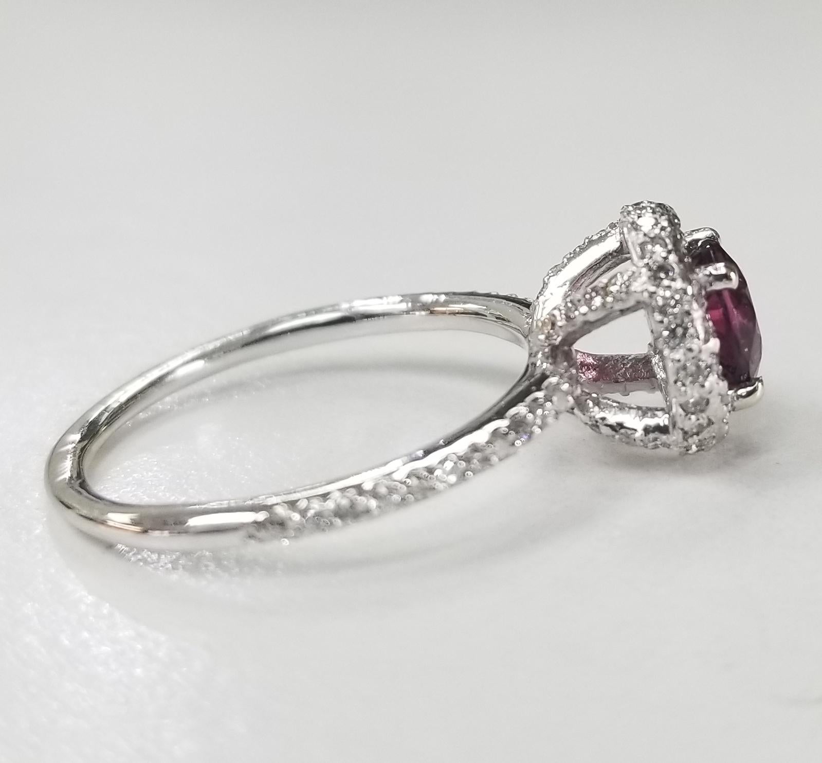 Contemporary 14 Karat White Gold Pink Tourmaline Diamond Halo Ring For Sale