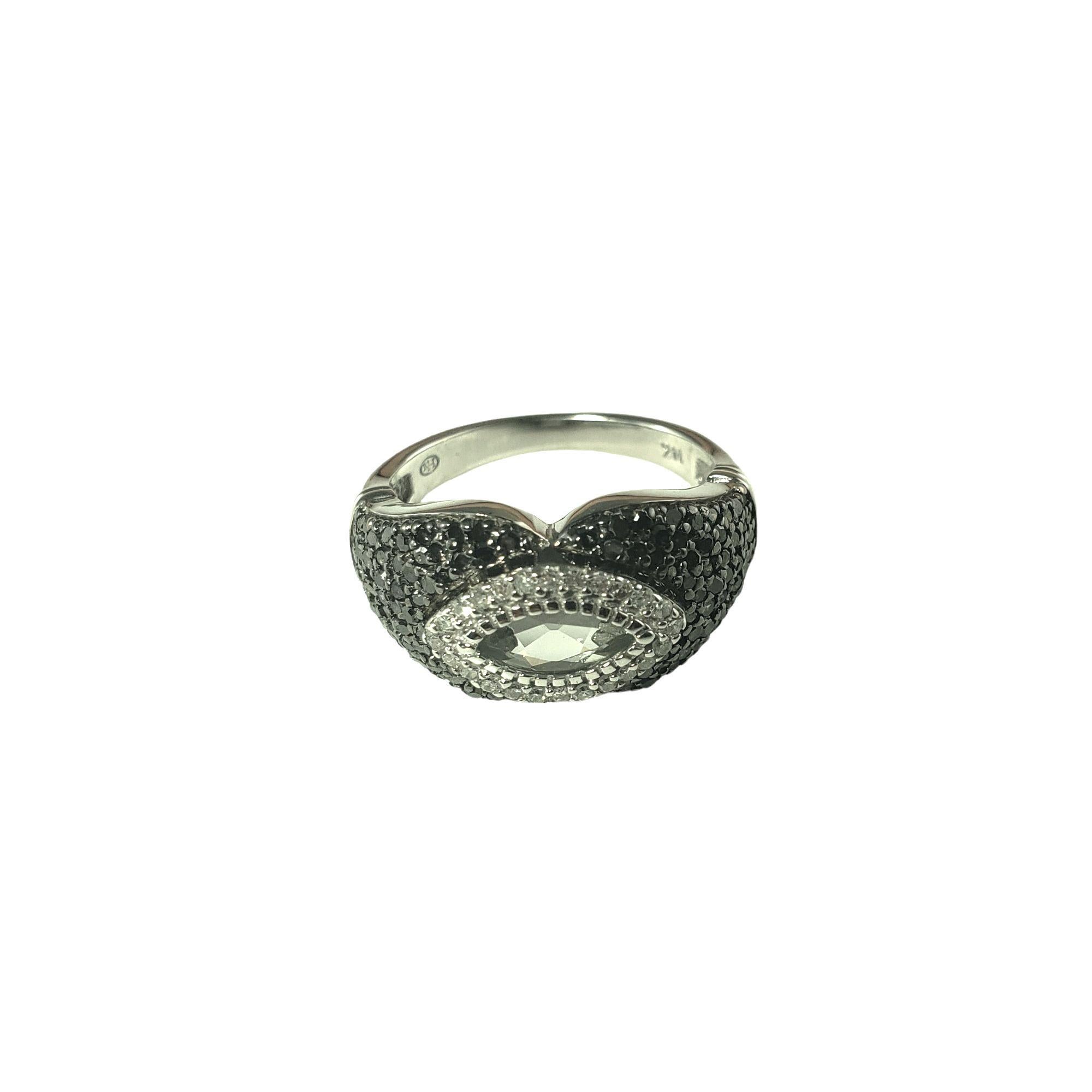 Vintage 14 Karat White Gold Prasiolite and Diamond Ring Size 6  JAGi Certified-

This sparkling ring features one marquise cut prasiolite and 131 black and white diamonds set in classic 14K white gold. Width: 10 mm.

Shank: 3 mm.

Prasiolite weight: