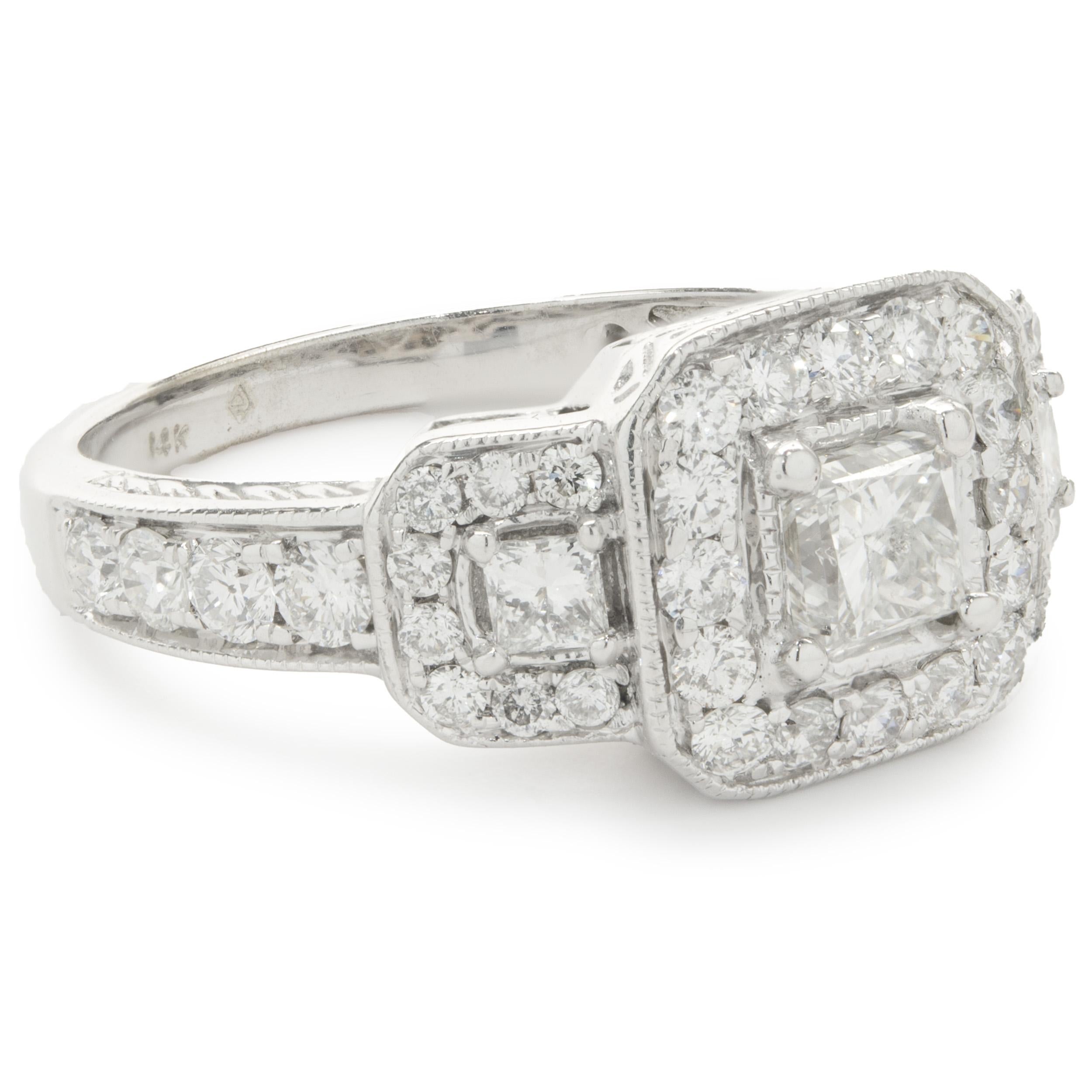 Designer: custom
Material: 14k white gold 
Diamond: 3 princess cut = 0.53cttw
Color: G
Clarity: SI1-2
Diamond: 40 round brilliant cut = .72cttw
Color: G
Clarity: SI1-2
Ring Size: 7 (please allow two additional shipping days for sizing