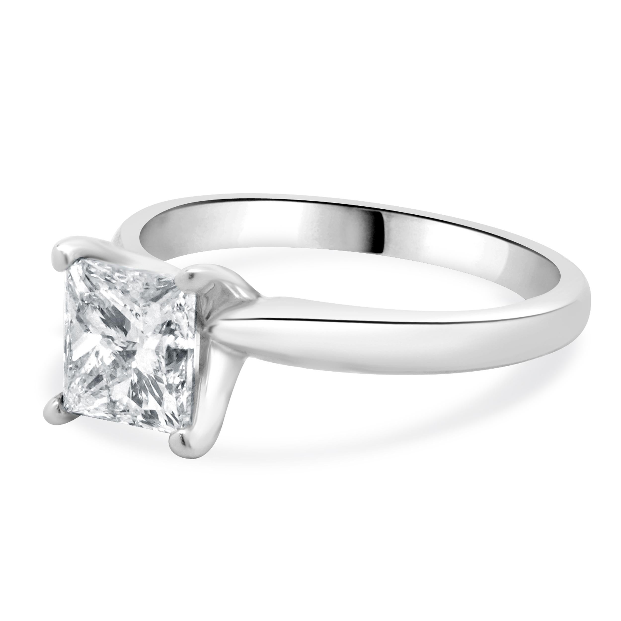 Designer: custom
Material: 14K white gold
Center Diamond: 1 princess cut = 1.10ct
Color : F
Clarity : I1
GSI: 34886900114
Size: 3.5 complimentary sizing available 
Weight: 2.37 grams
