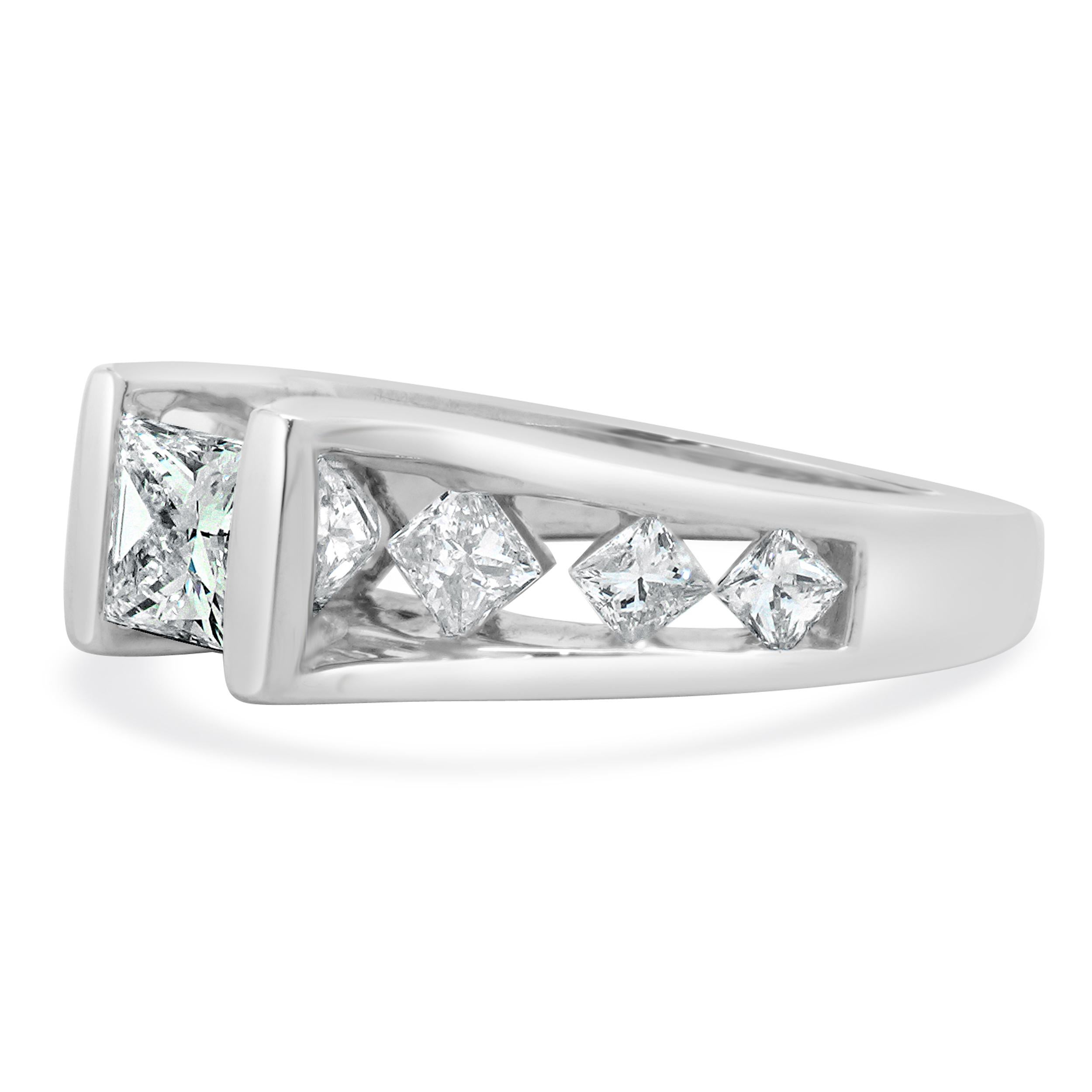 Designer: custom
Material: 14K white gold
Center Diamond: 1 princess cut = 0.70ct
Color : H
Clarity : I1
Diamonds: 7 princess cut = 0.95cttw
Color: H/I
Clarity: SI2-I1
Size: 7.25 complimentary sizing available 
Weight: 6.84 grams