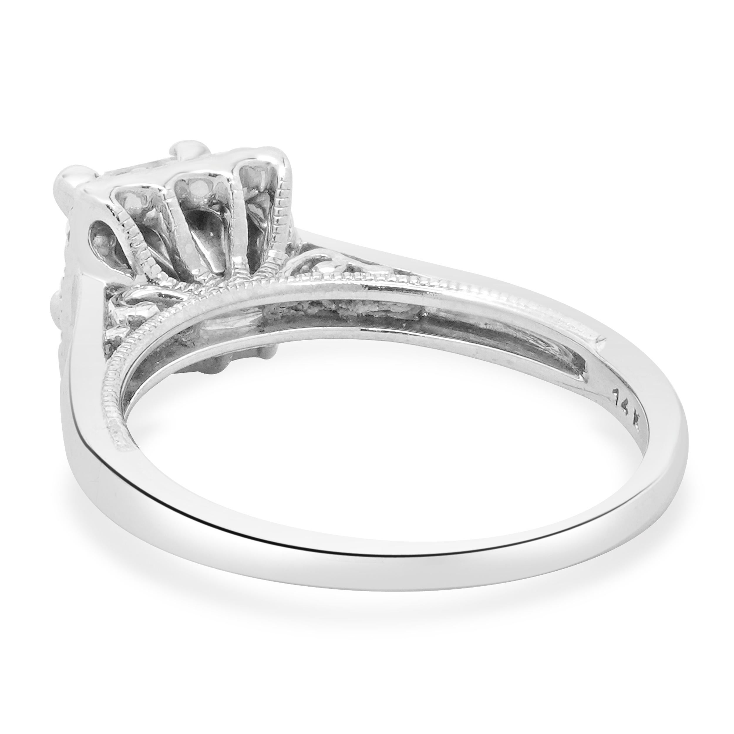 Designer: custom
Material: 14K white gold
Diamond: 1 princess cut = 0.77ct
Color: H
Clarity: I1
Diamond: 20 round brilliant cut = 0.20cttw
Color: G
Clarity: SI1
Ring size: 7.25 (please allow two additional shipping days for sizing requests)
Weight: