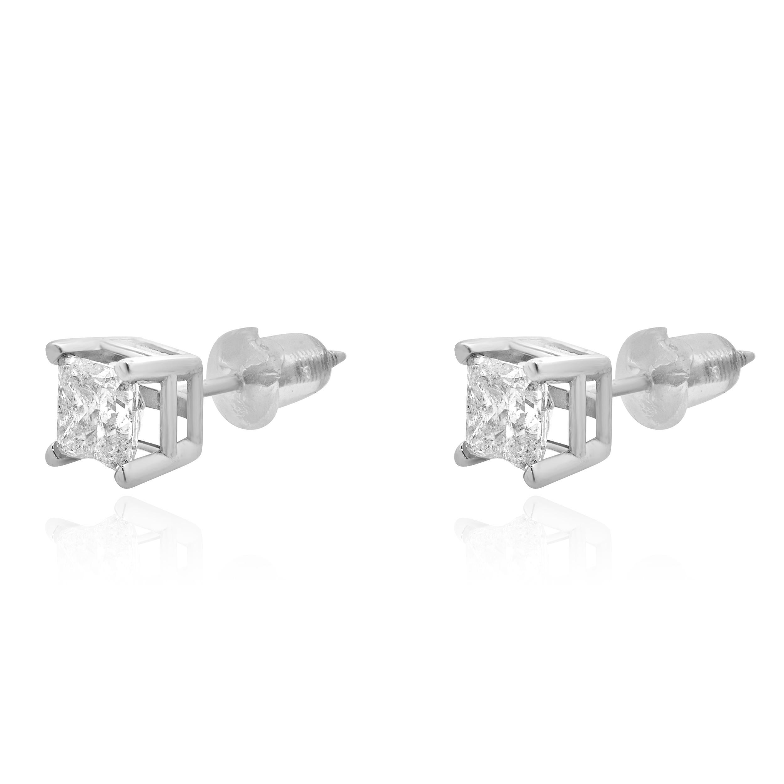 Material: 14K white gold
Diamonds: 2 princess cut = 1.00cttw
Color: H
Clarity: I1-2
Dimensions: earrings measure approximately 5.72mm in diameter
Fastenings: screw backs
Weight: 0.89 grams