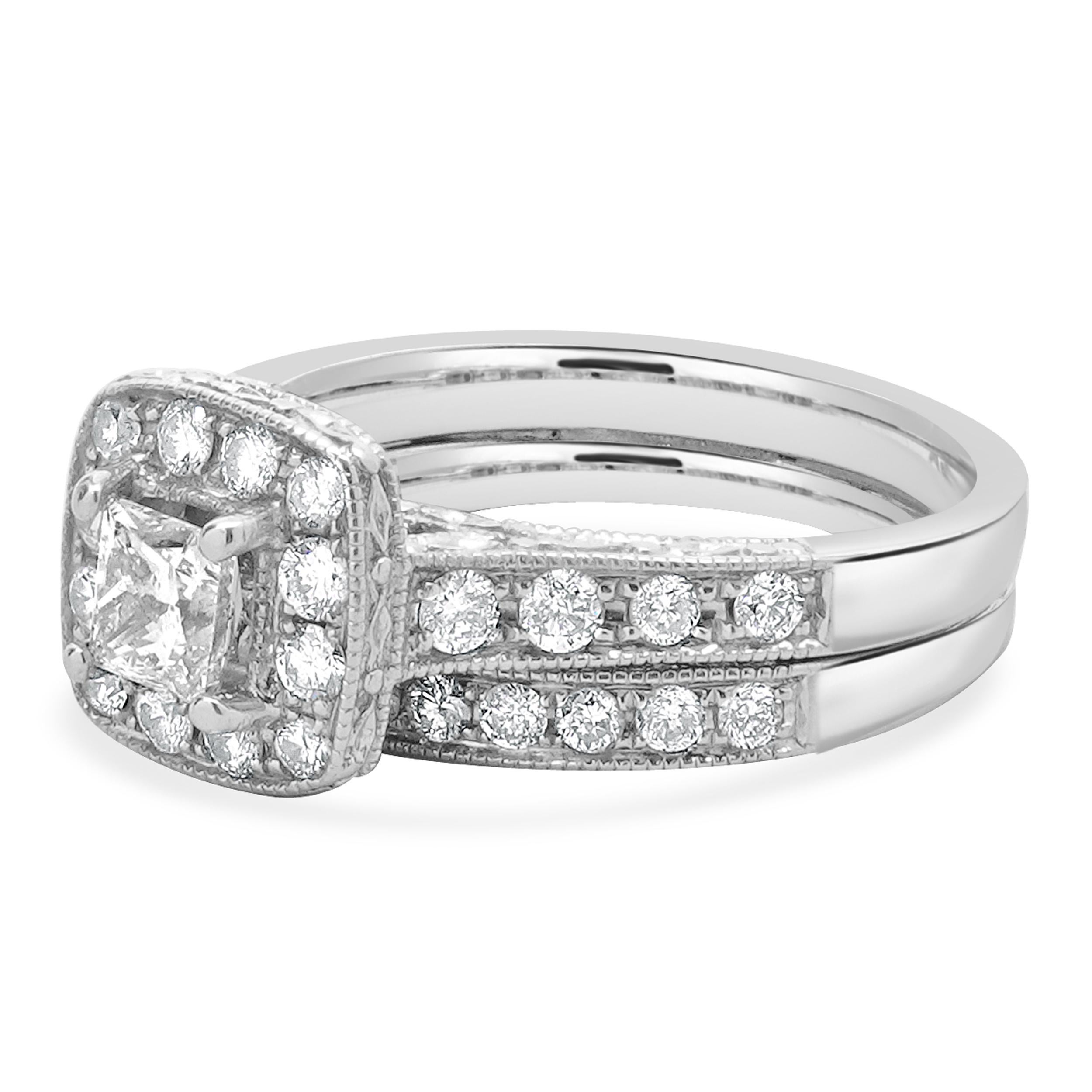 Designer: custom
Material: 14k White Gold
Diamond: 0.40cttw
Color: I
Clarity: SI2
Diamonds: 33 round diamonds= 0.60cttw
Color: H
Clarity: I1
Ring Size: 6.5 (please allow two additional shipping days for sizing requests)
Dimensions: ring top measures